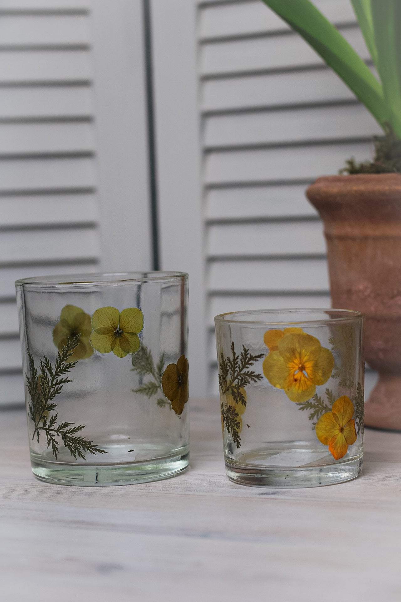 glass tea light holders with yellow flowers