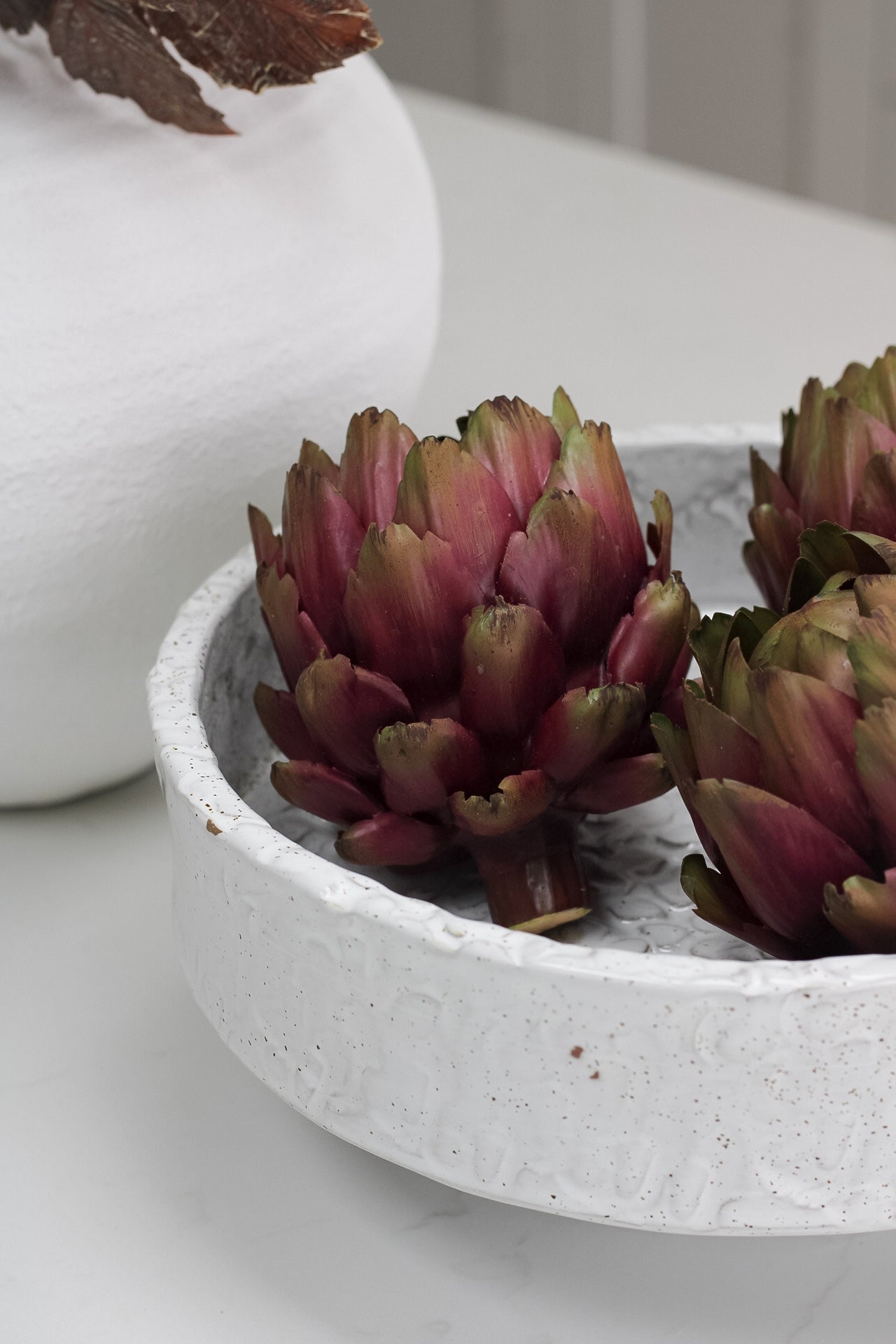 faux purple artichoke decoration for fruit bowls