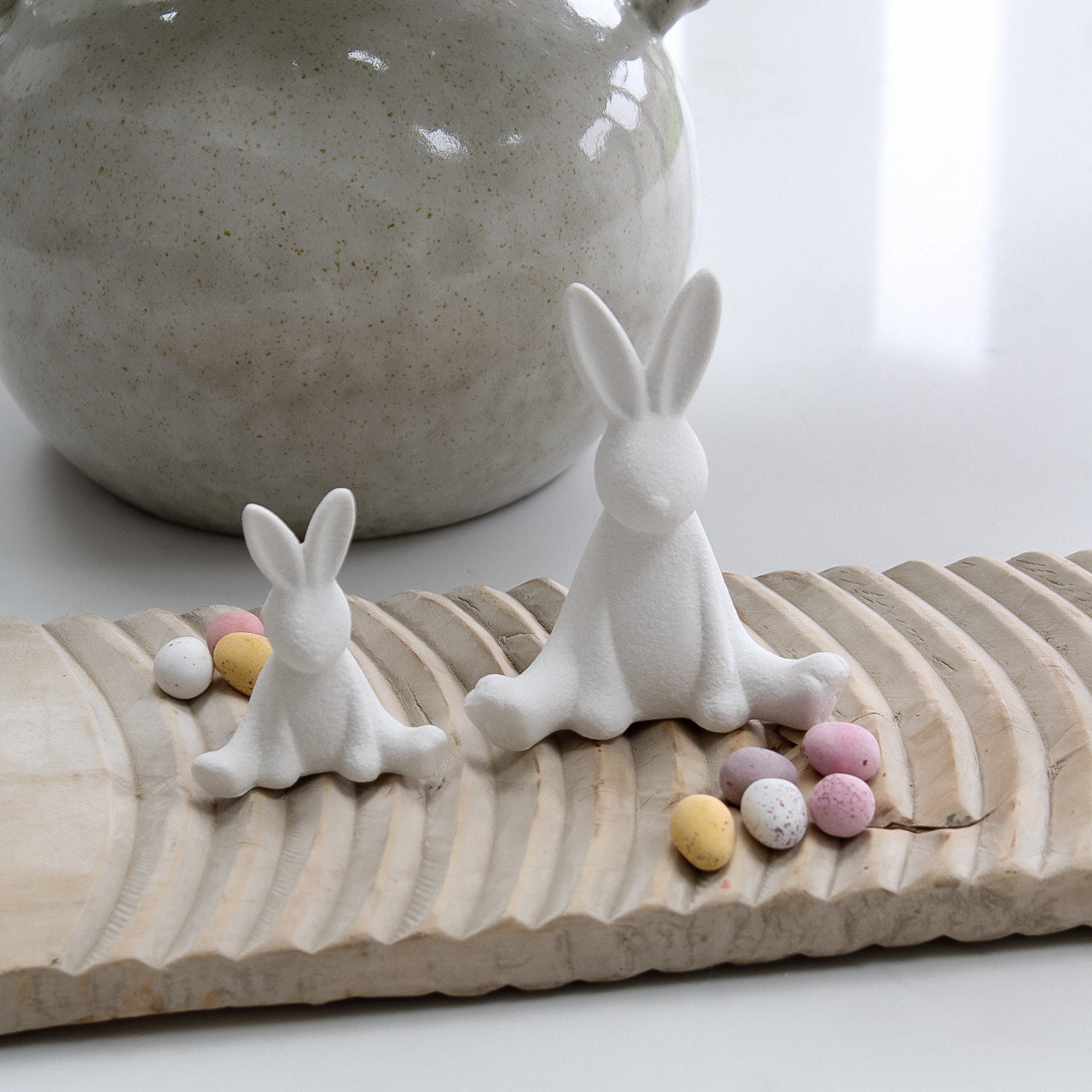 close up of bunnies sat on washboard