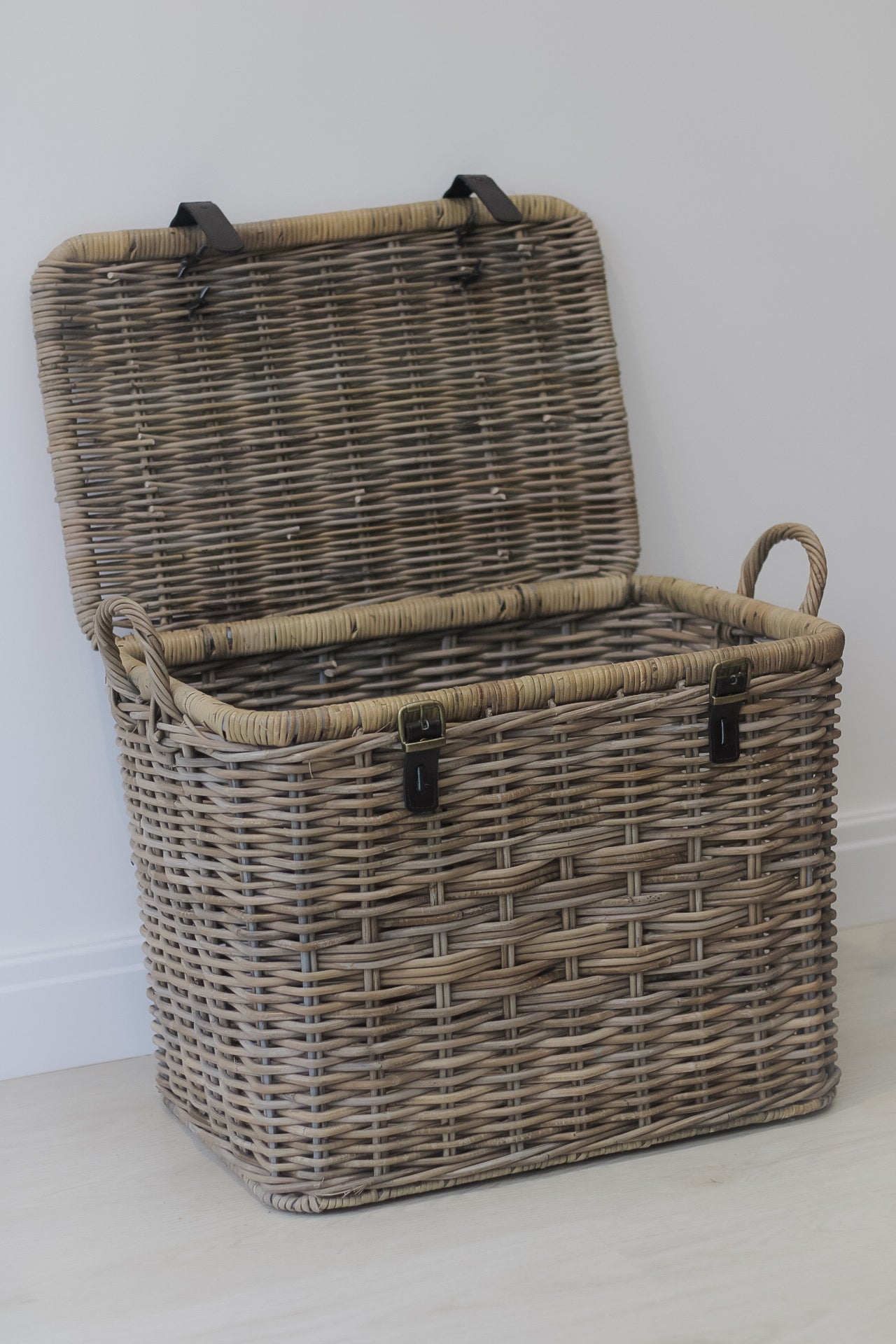 open wicker storage trunk for home decor