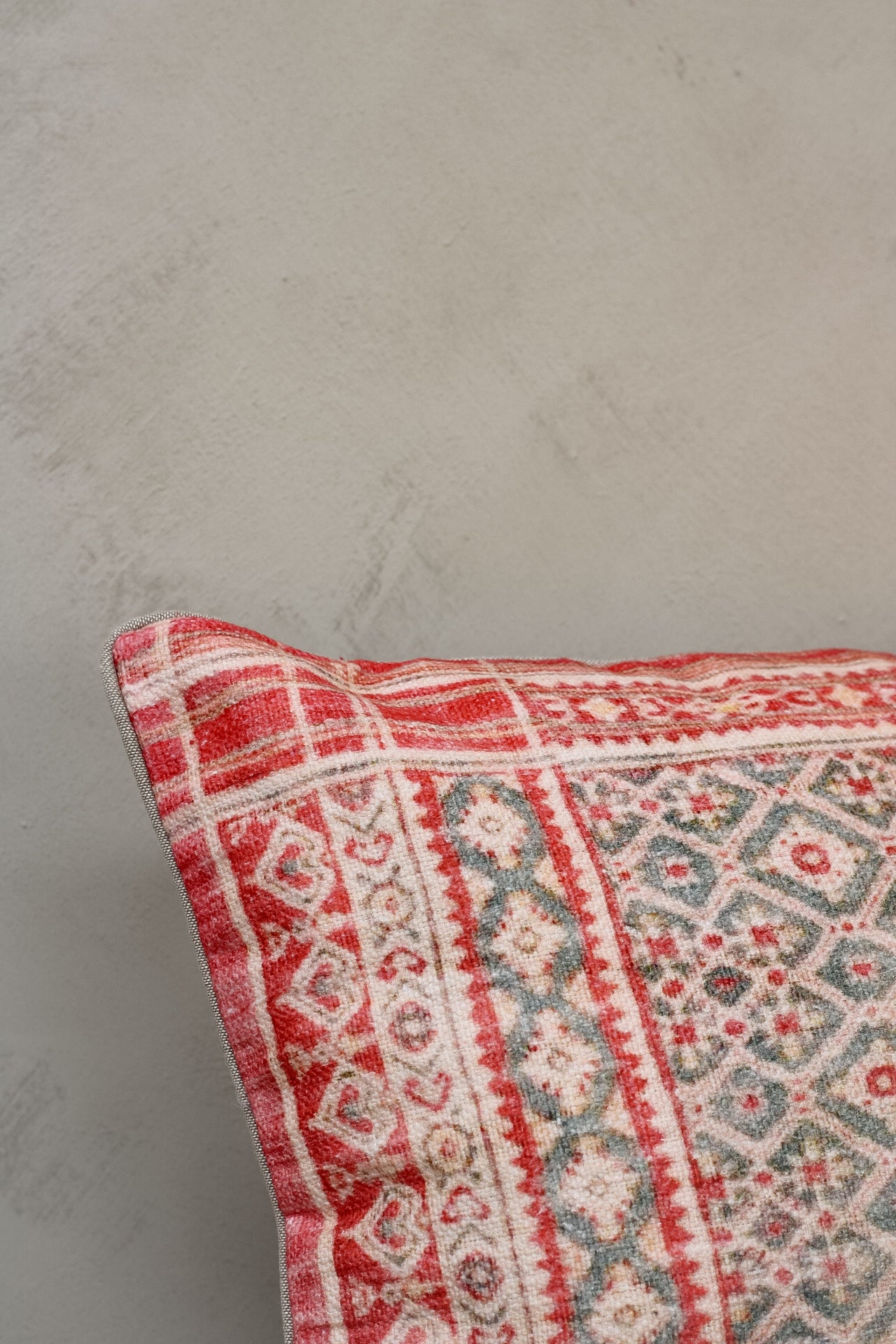 Red and Beige Patterned Cushion