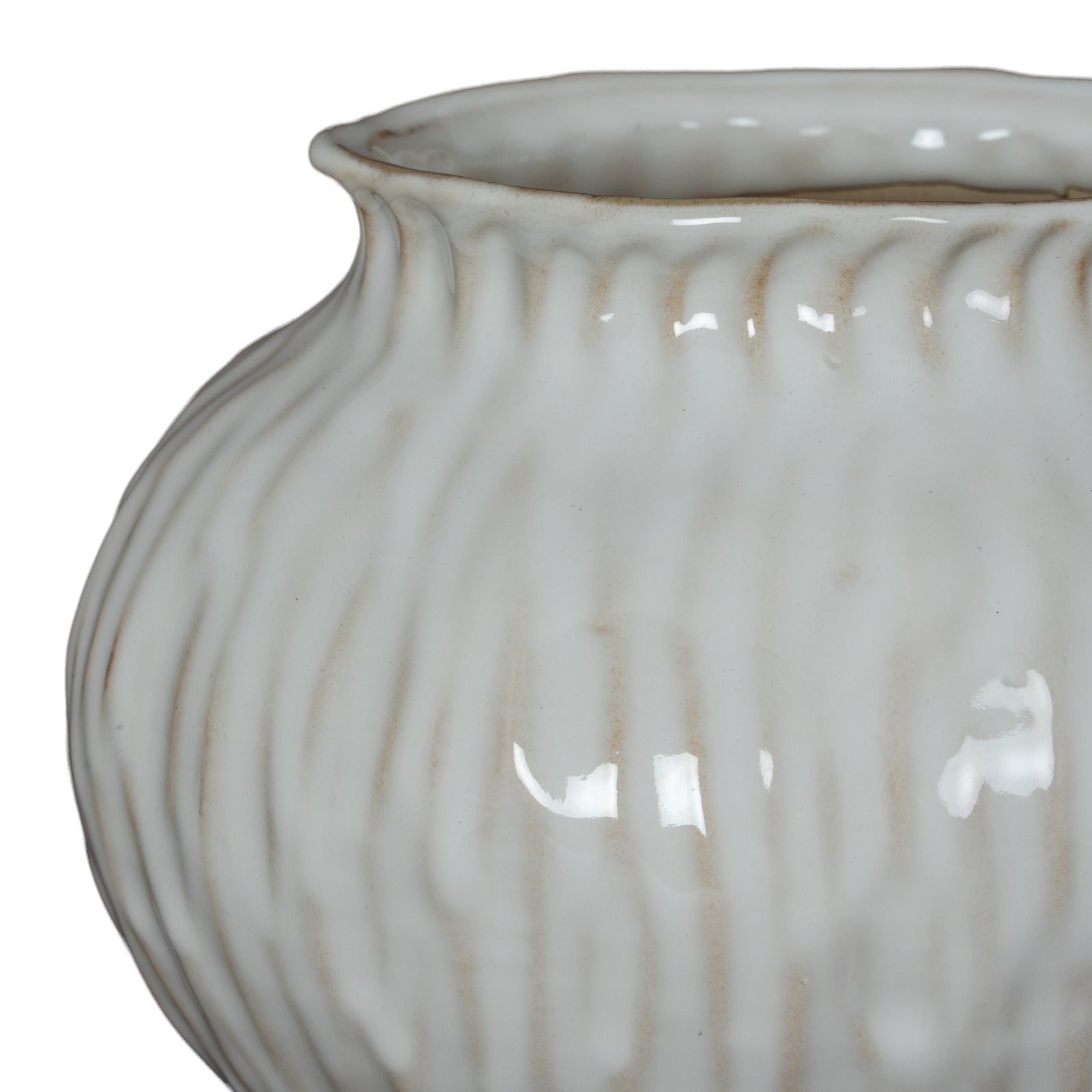 Close-up of a textured ceramic vase on a white background