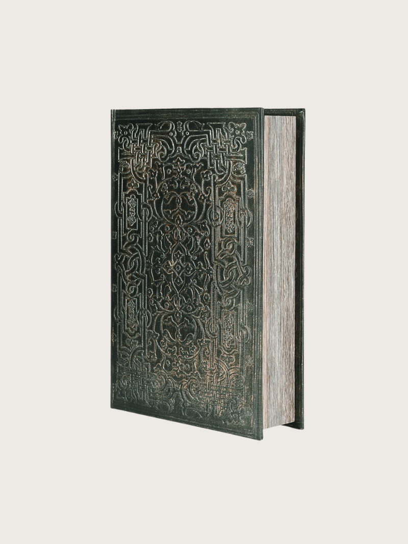 Decorative book with intricate patterns on a white background