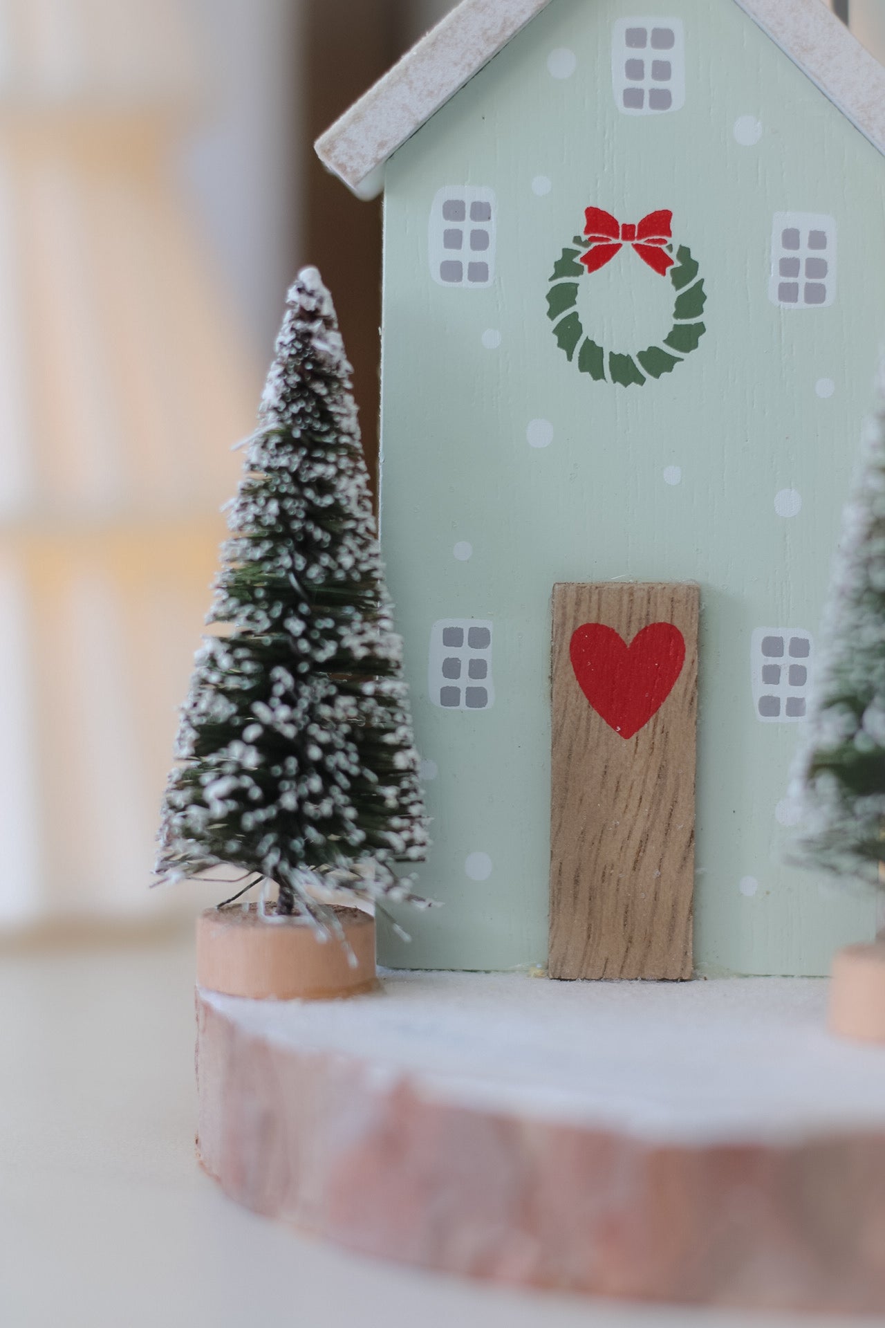 Merry Christmas Houses on Wooden Log Slice
