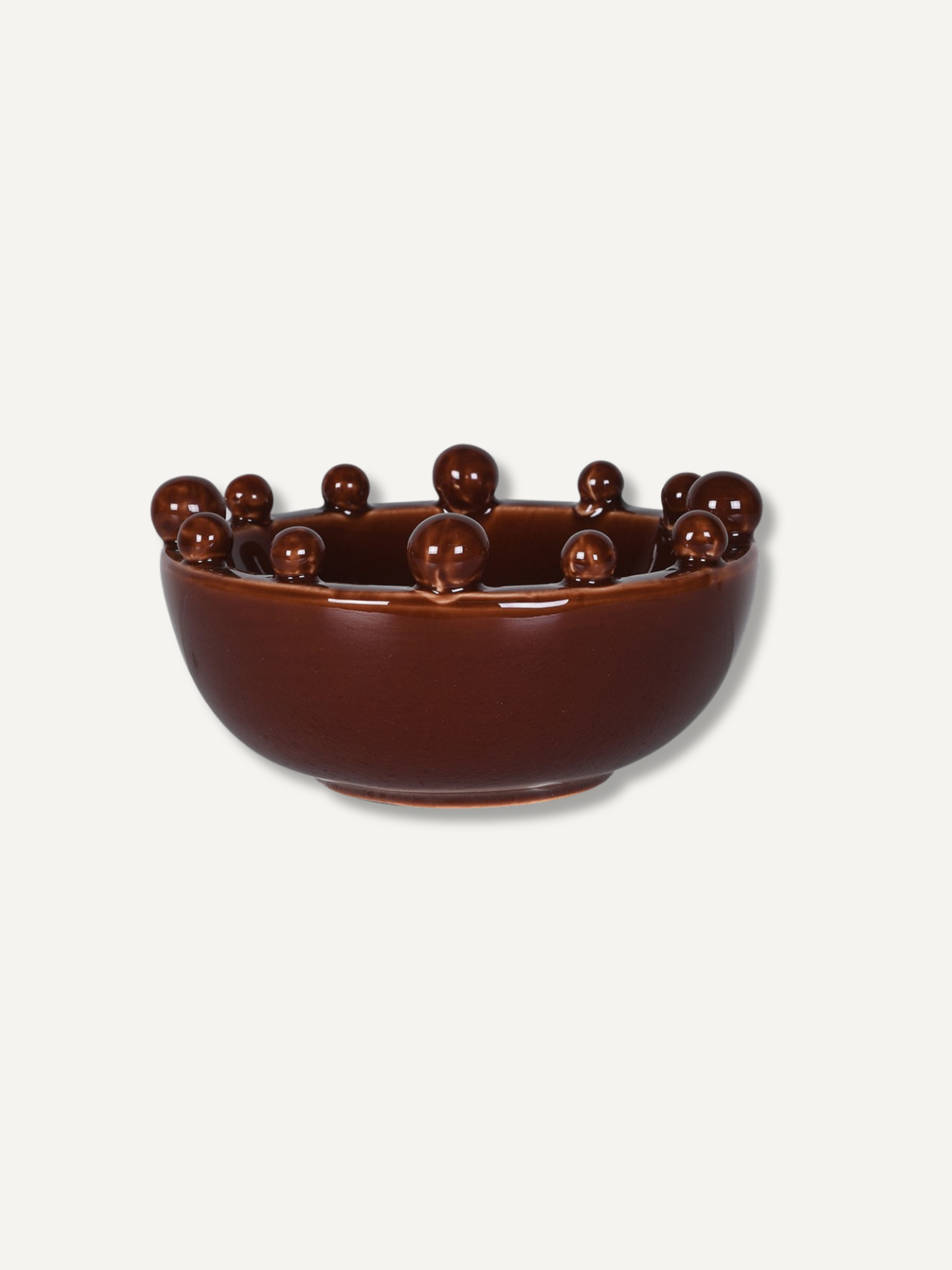 Brown glazed toned decorative bowl with small bobble design around the rim