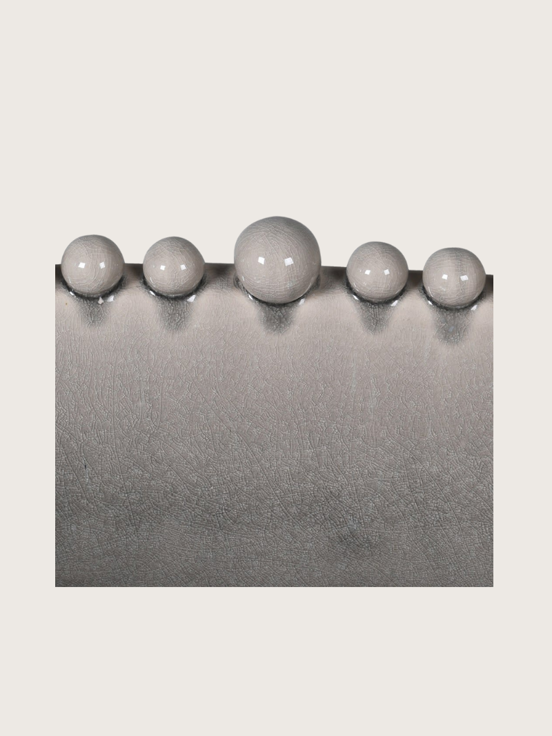 upclose of cream oval bobble bowl