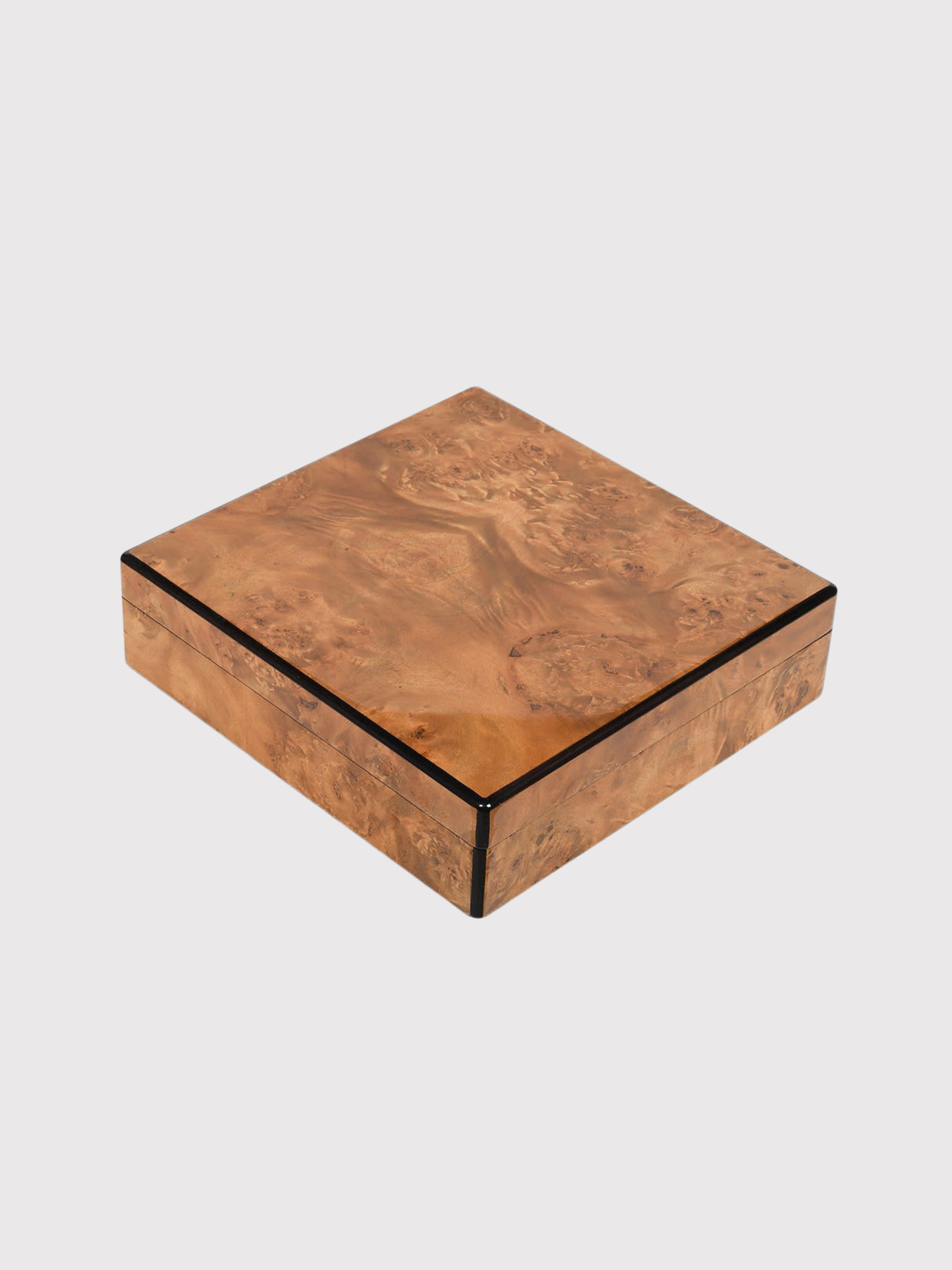 faux burl wood box with a decorative pattern on a light gray background