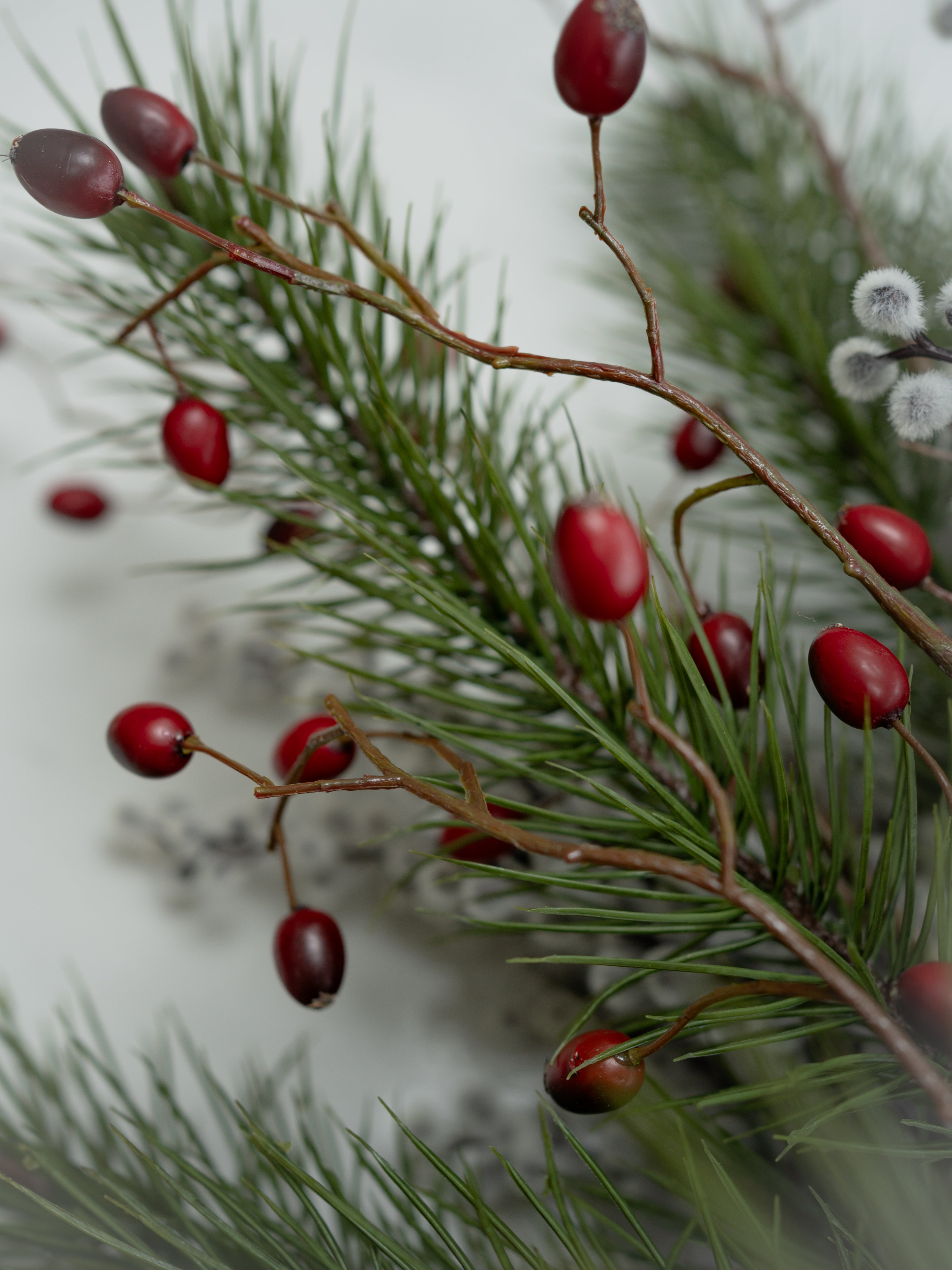 Faux Pine, Snowy Berry and Rosehip Branches Floral Arrangement