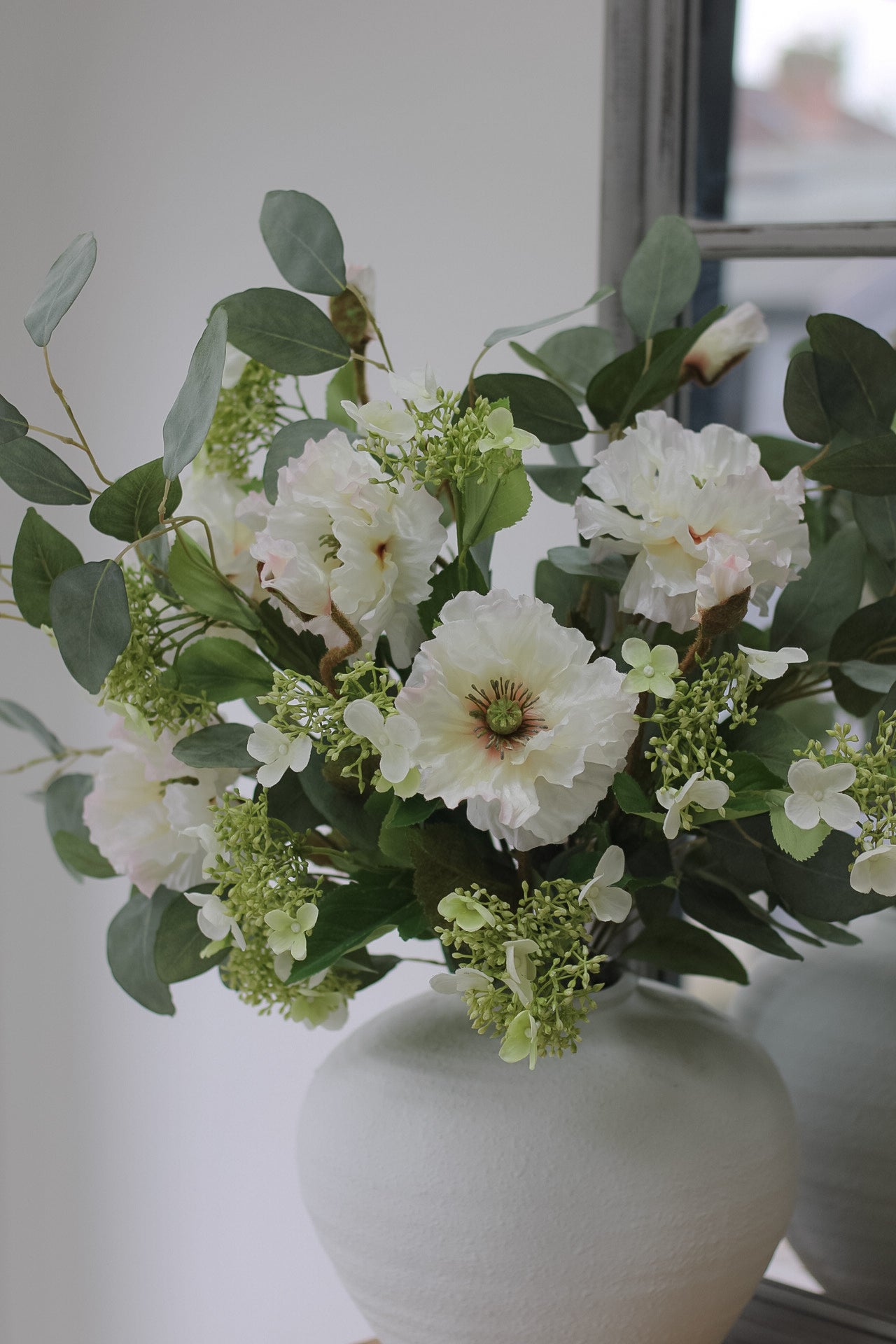Faux Poppy and Viburnum with Eucalyptus Arrangement in white ceramic vase