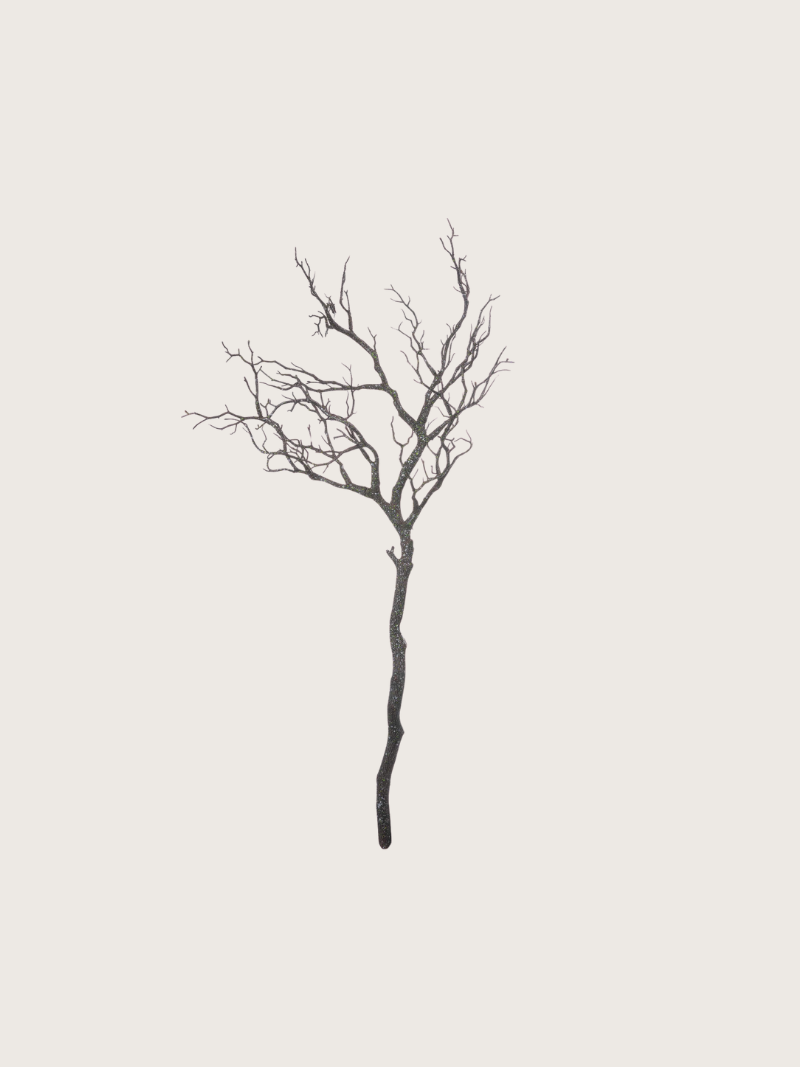 Black silhouette of a bare branch on a light gray background