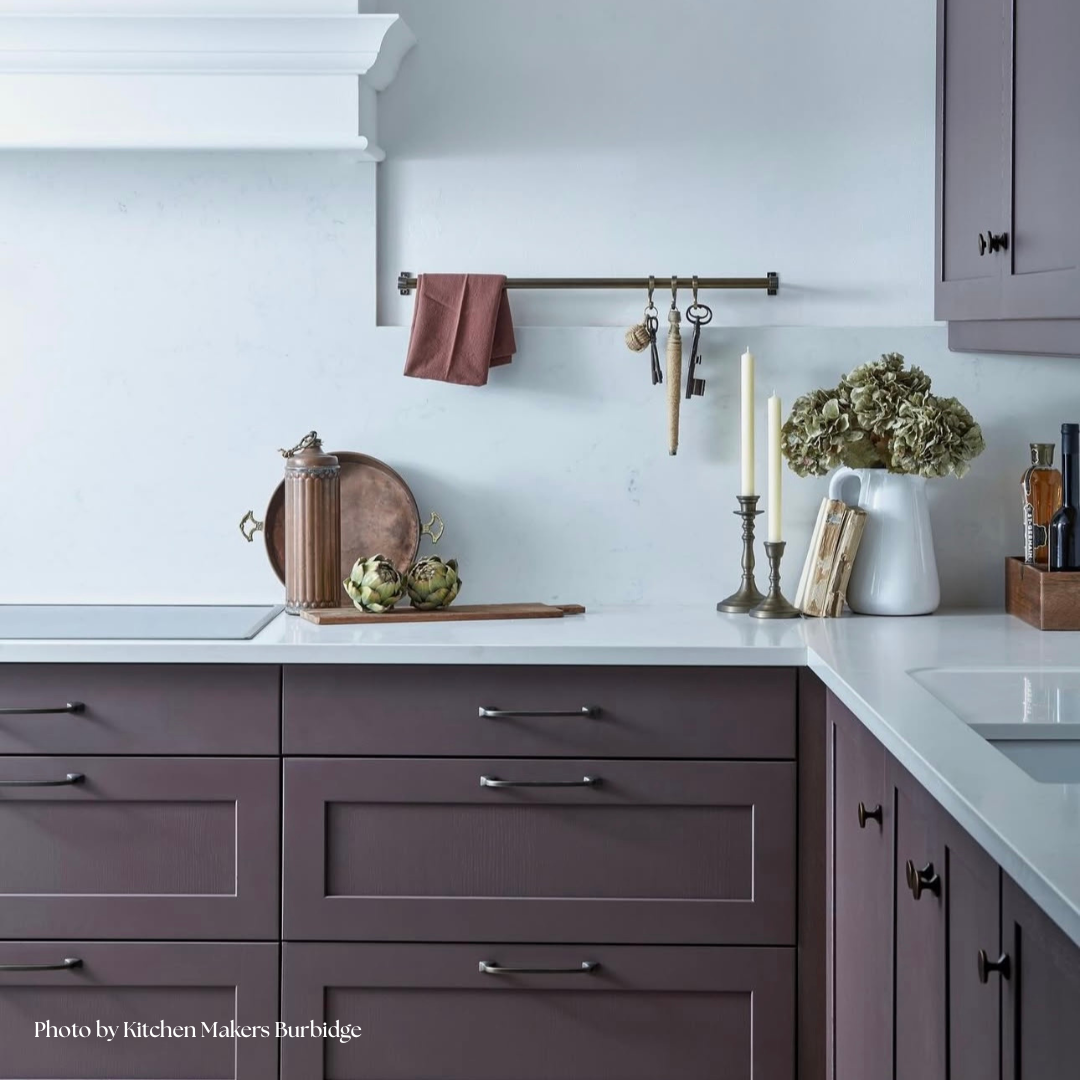 Faux earthy green dried ruffle hydrangea on kitchen worktop shown with plum toned kitchen