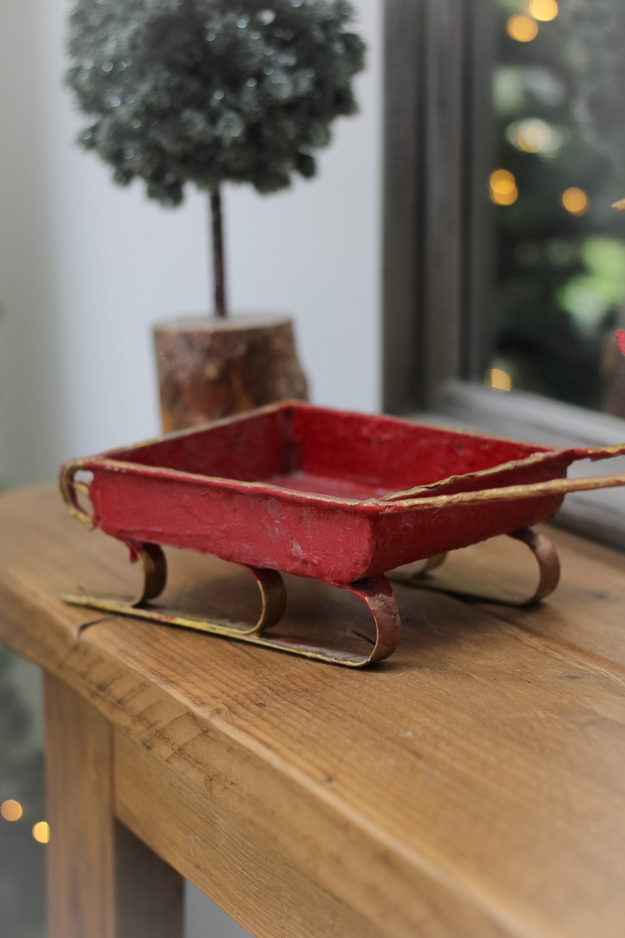 red sleigh decoration