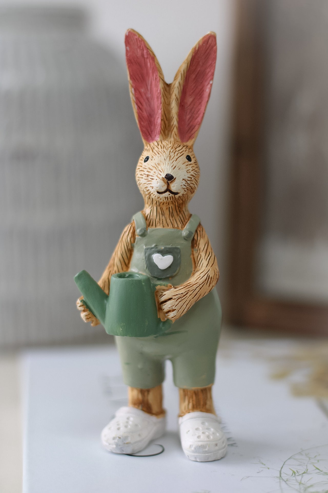 standing gardening rabbit ornament with watering can