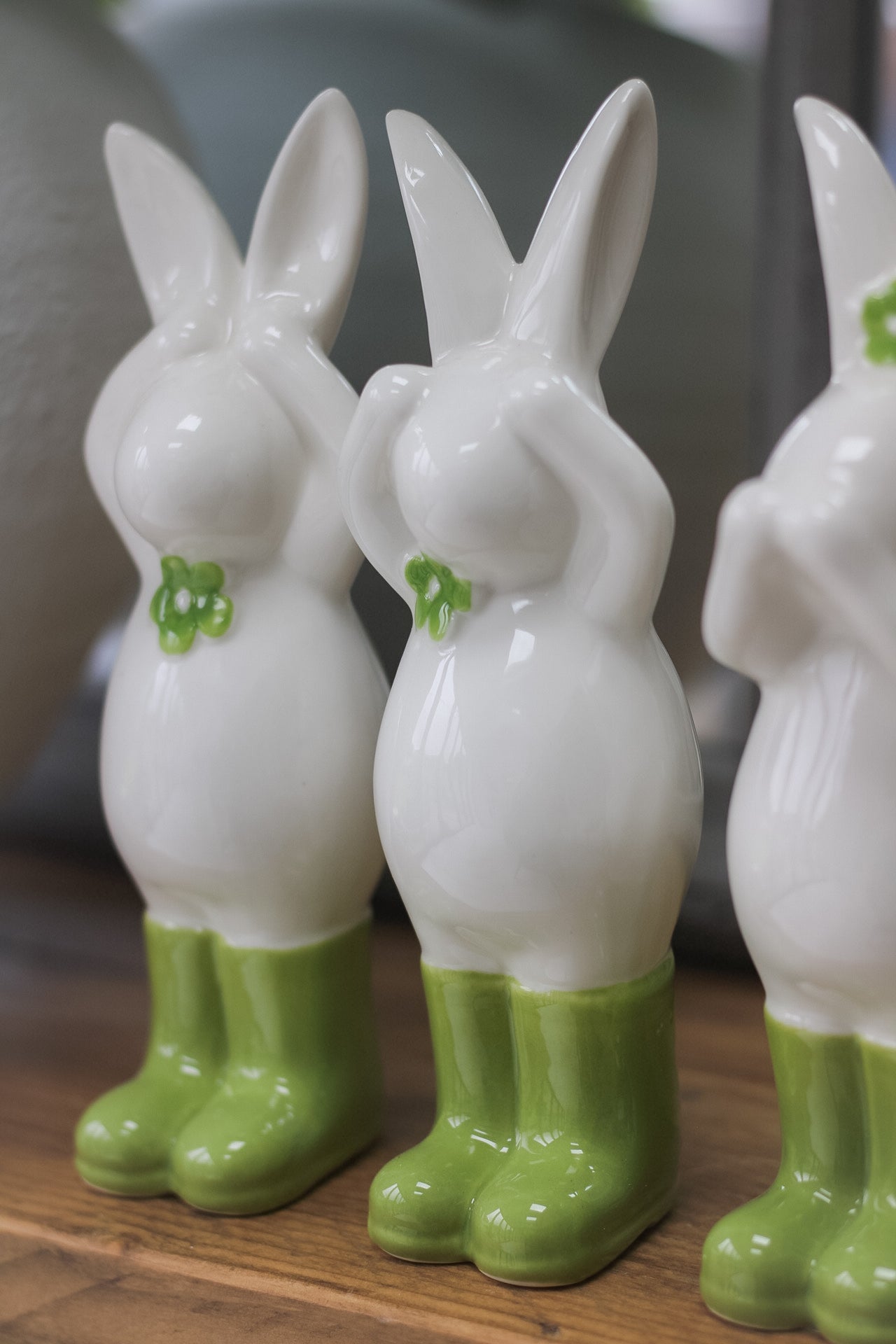 set of floral porcelain bunnies with green boots