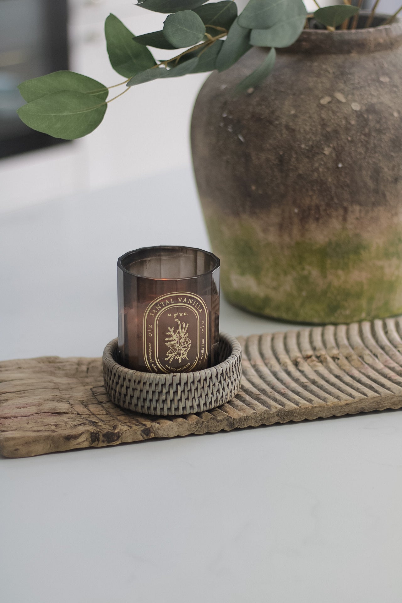 Candle in rattan coaster