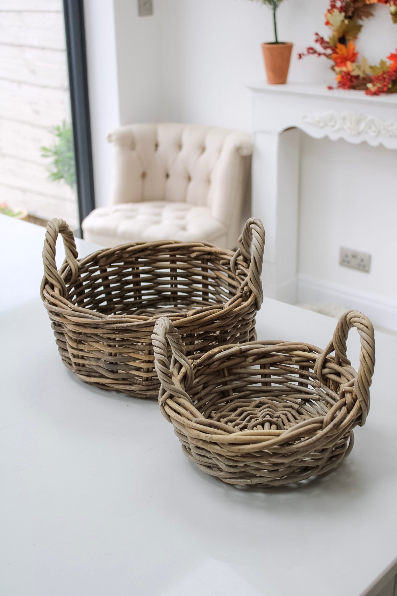 grey washed storage baskets on kitchen island