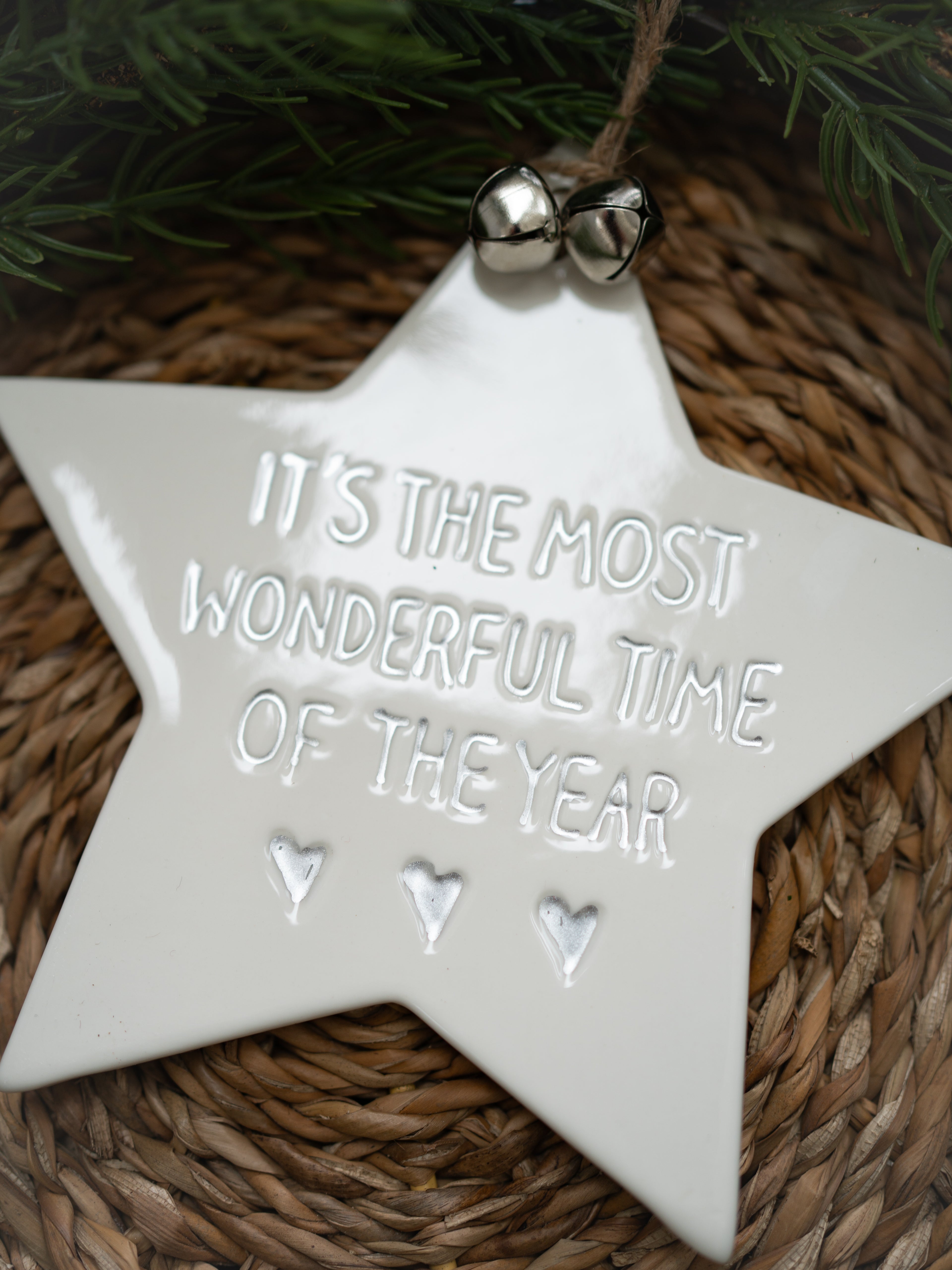 White star-shaped ornament with &