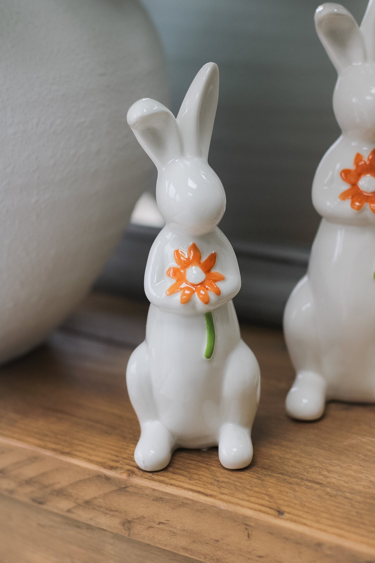 close up of Orange Floral Porcelain Bunnies