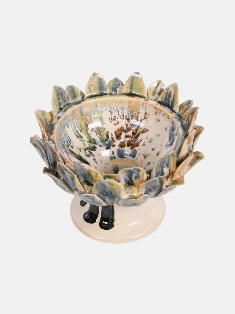 Ceramic bowl with decorative edge on a white background