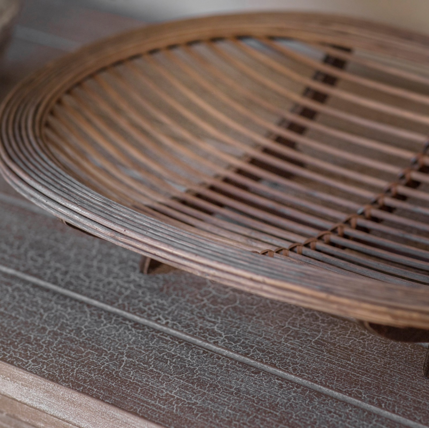 Raised woven cane rounded tray