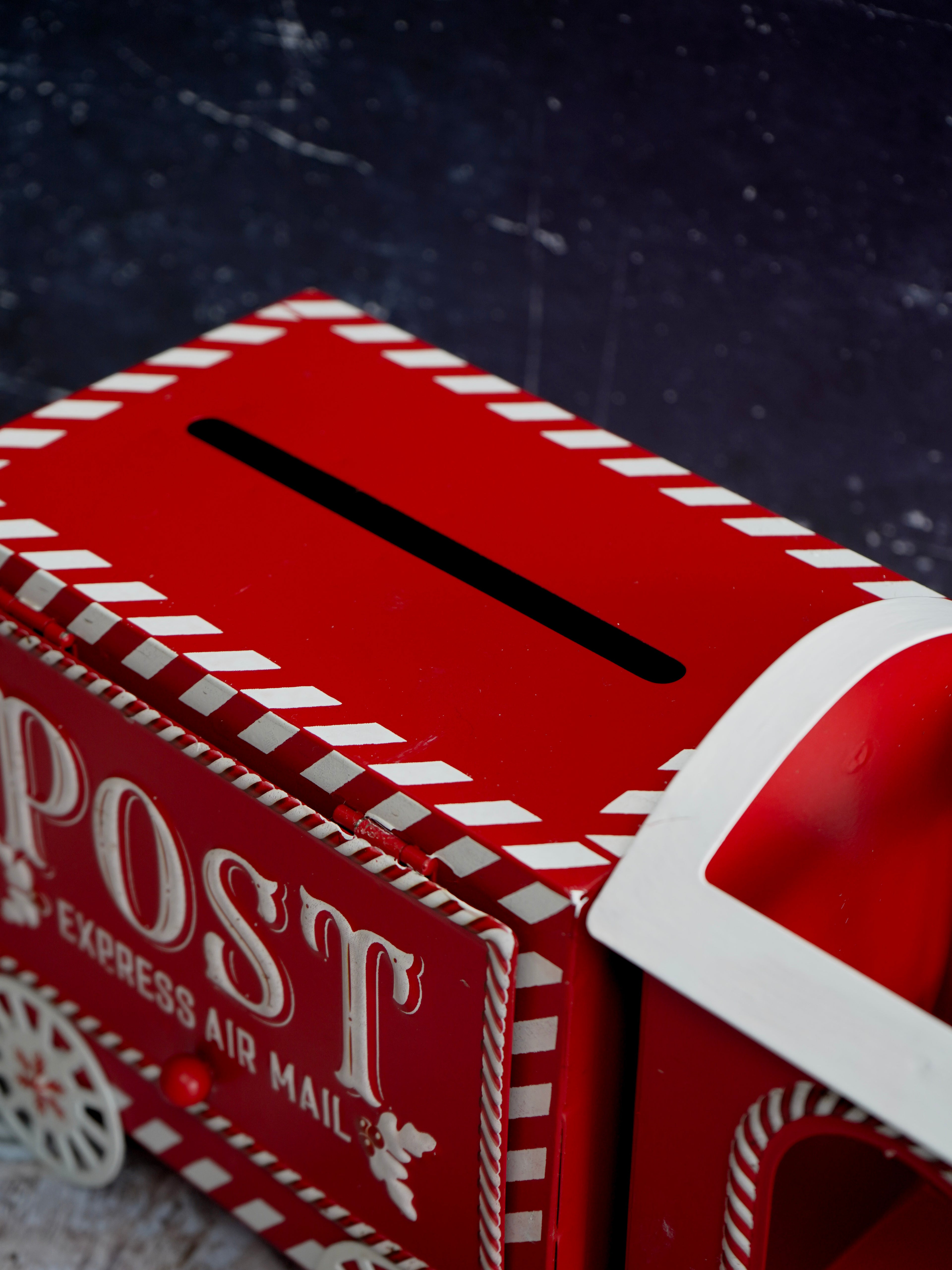 Red mailbox-shaped money box with &