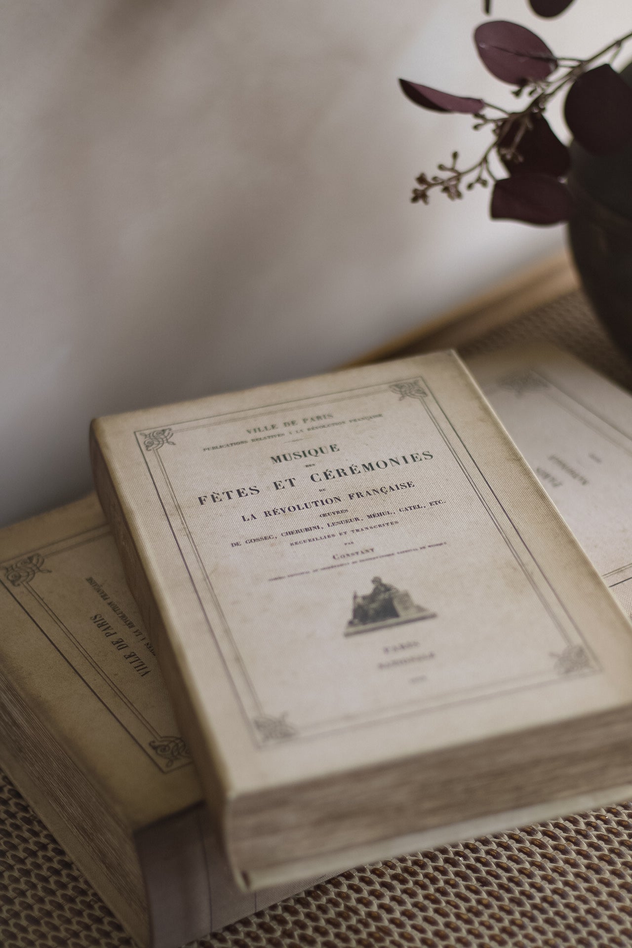 Vintage book with decorative cover on a textured surface