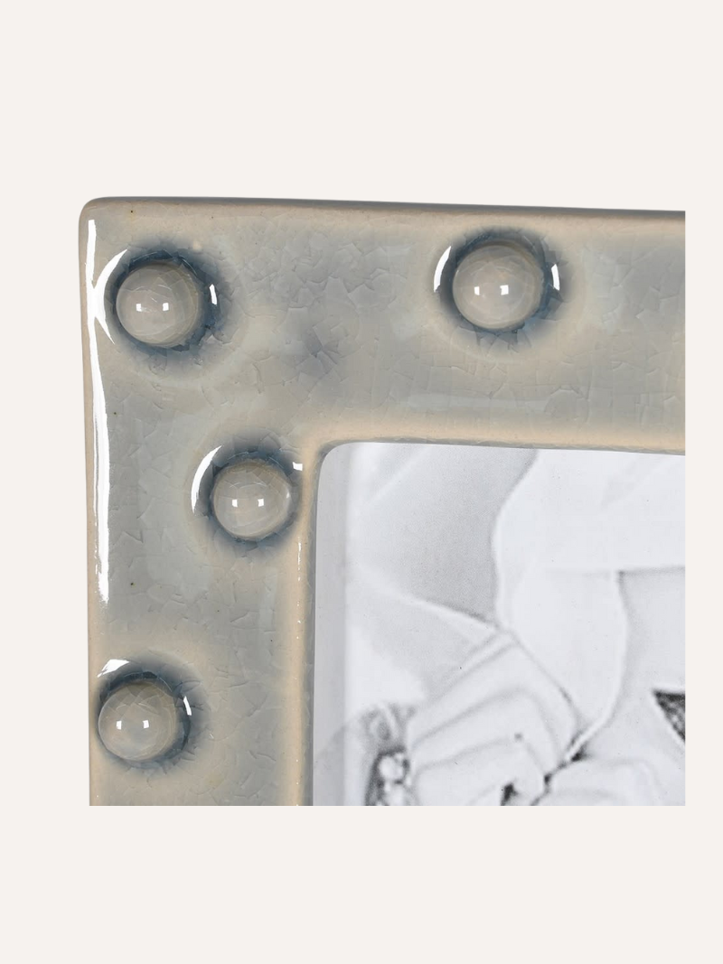 up close of grey ceramic photo frame