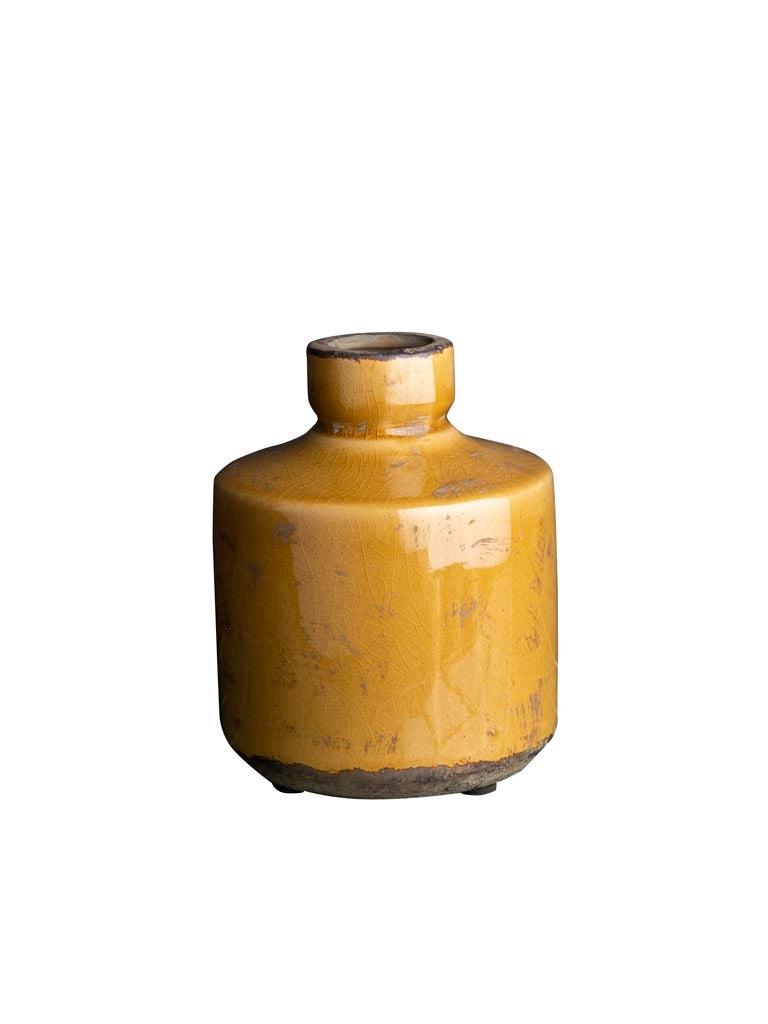 MUSTARD ceramic vase on a white background