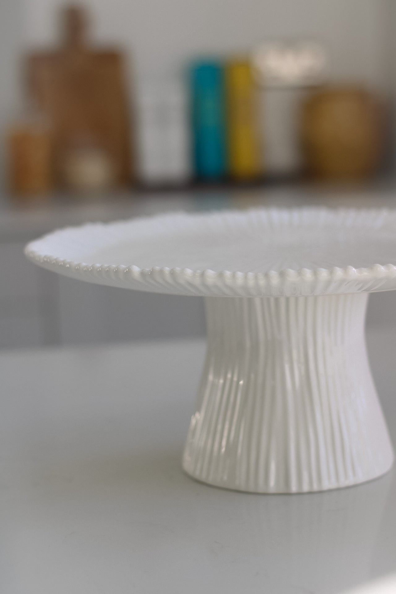 ridged white ceramic cake stand