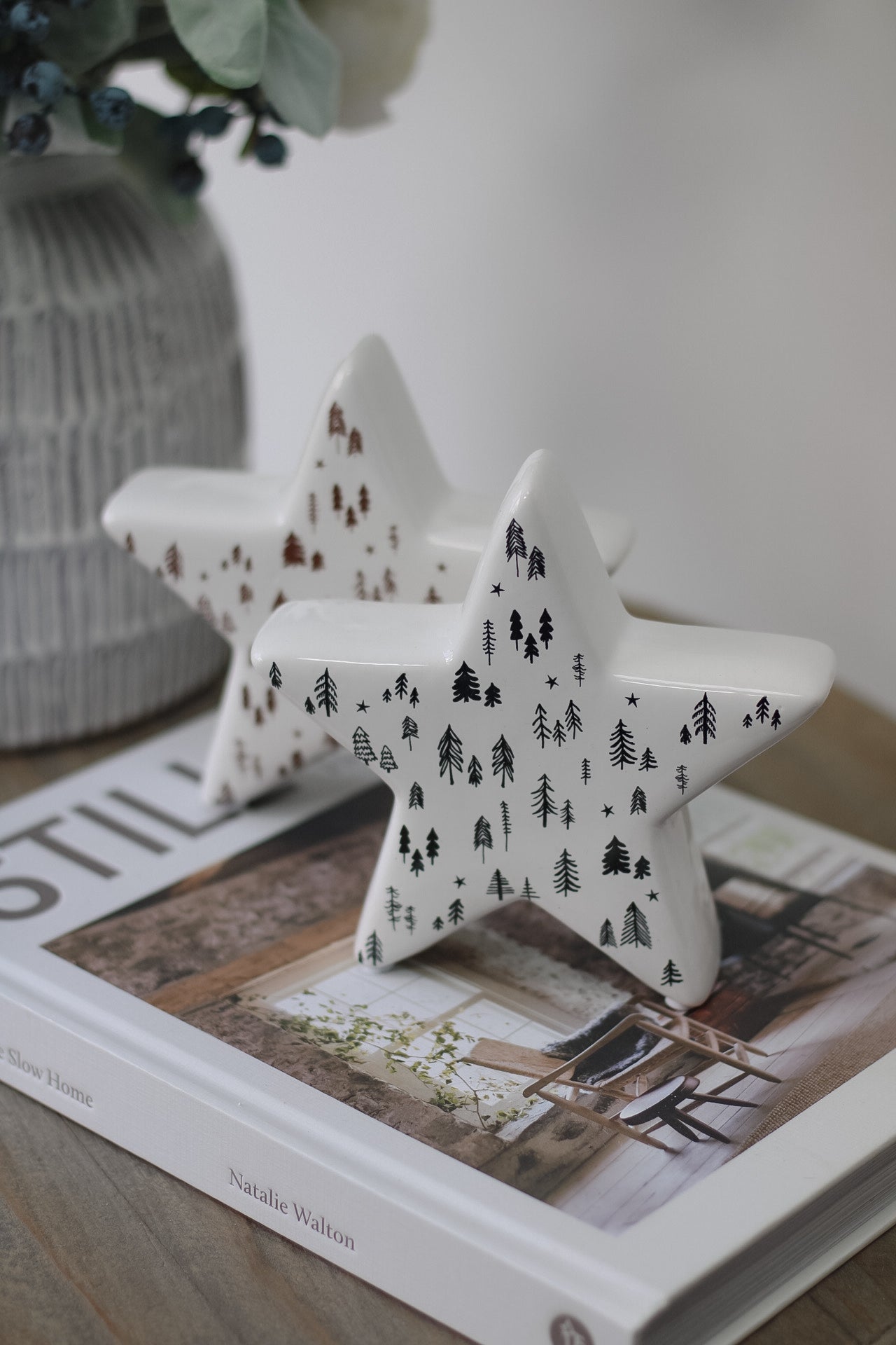White Ceramic Stars with Brown and Black Trees