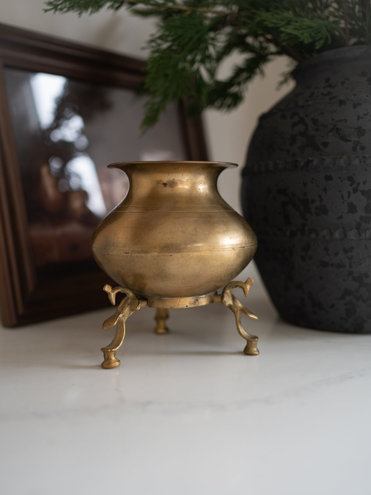 antique brass pot on legs