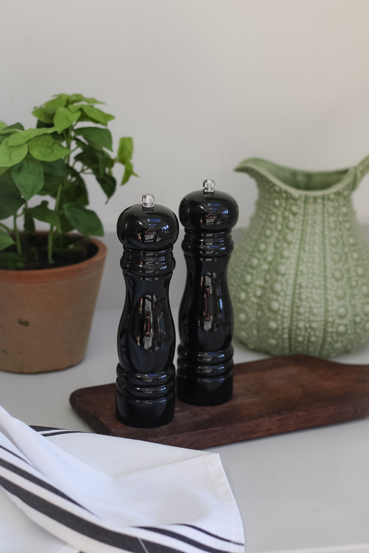black salt and pepper grinders for timeless kitchen decor
