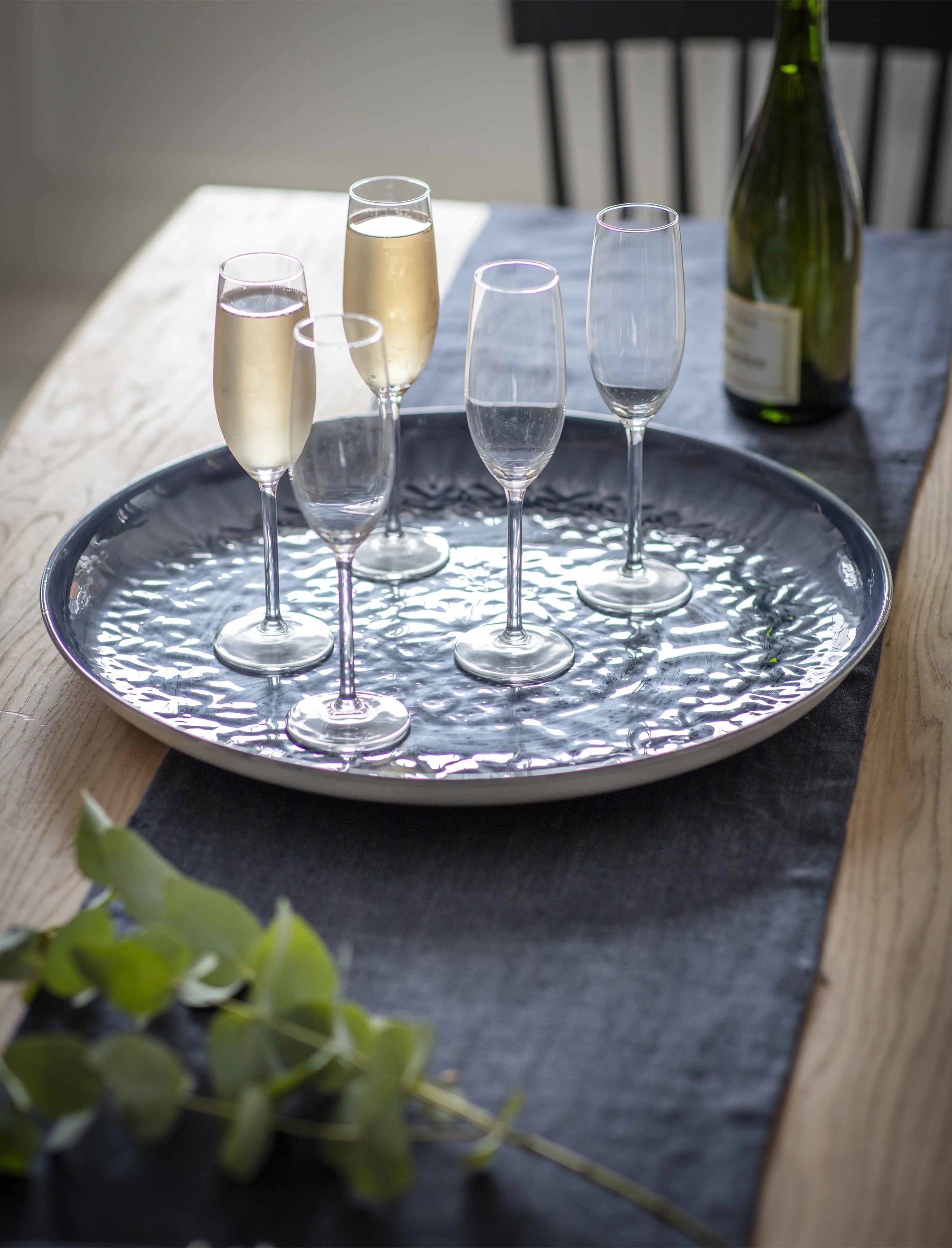 round blue metal tray, perfect for garden dining and home decor