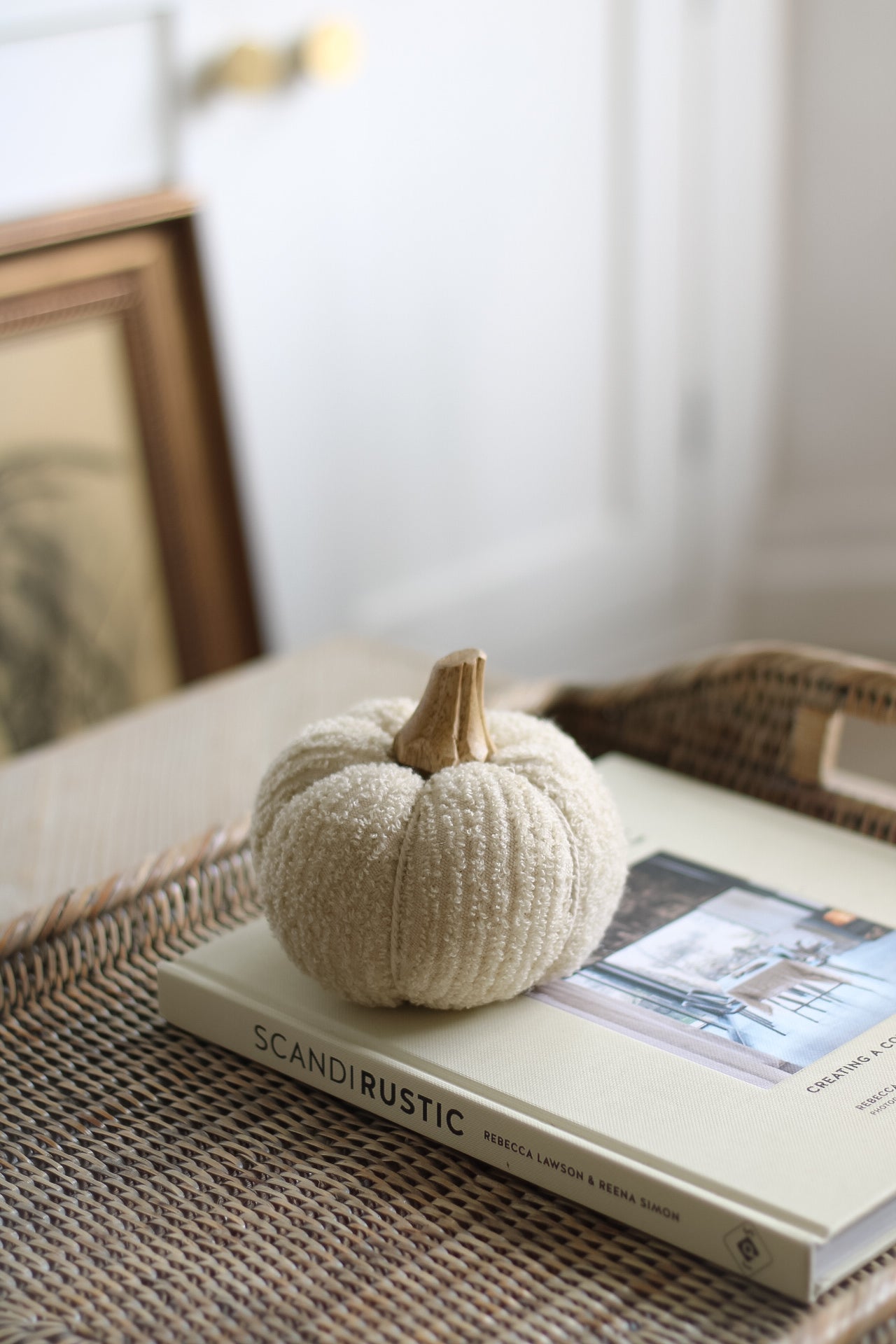 bobbled neutral fabric pumpkin with wooden stalk