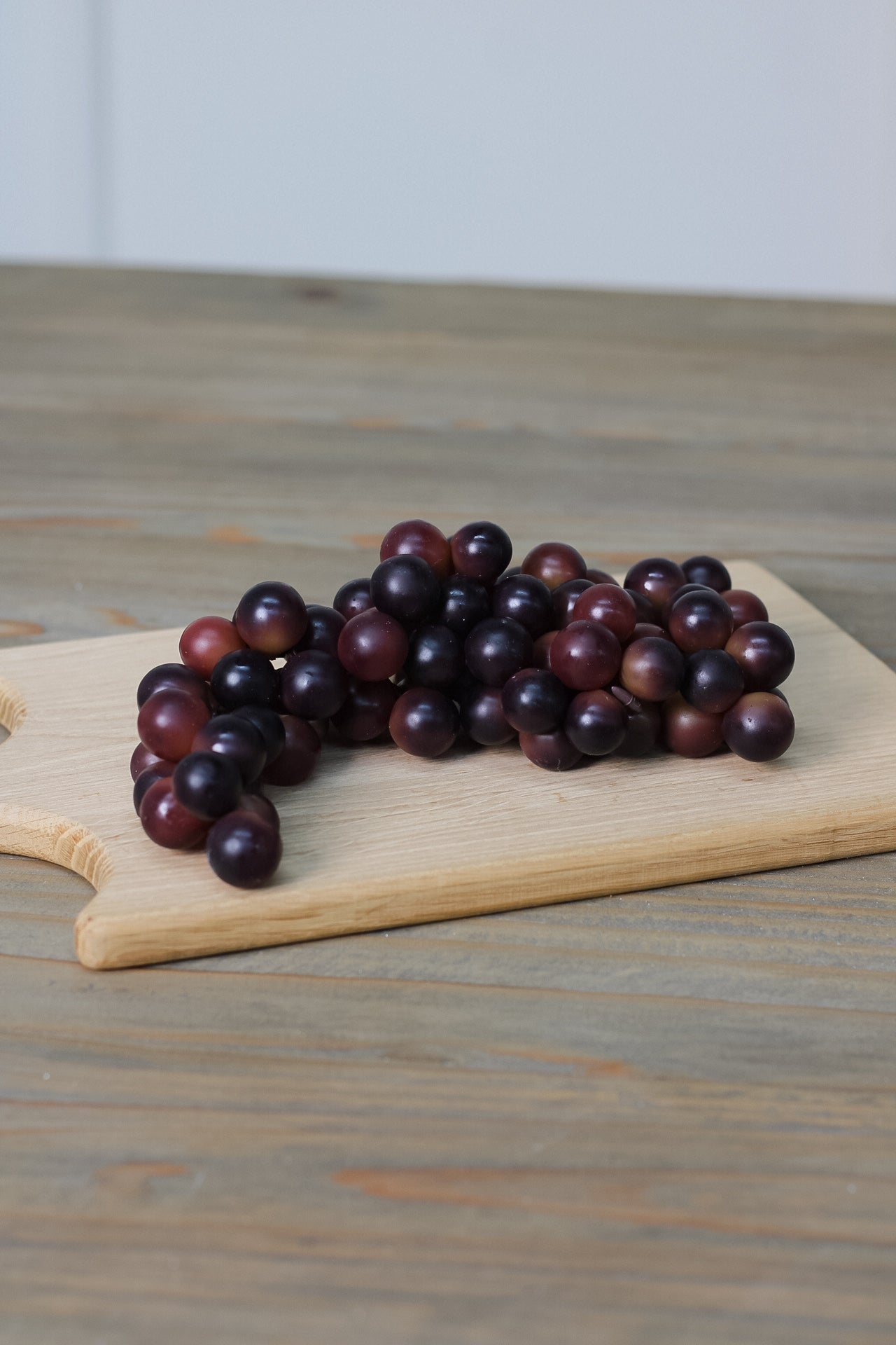 bunch of faux red grapes