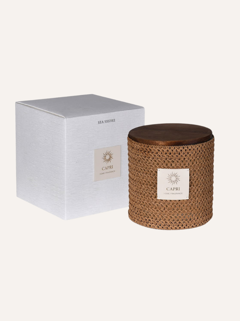 Woven candle with a white box on a white background