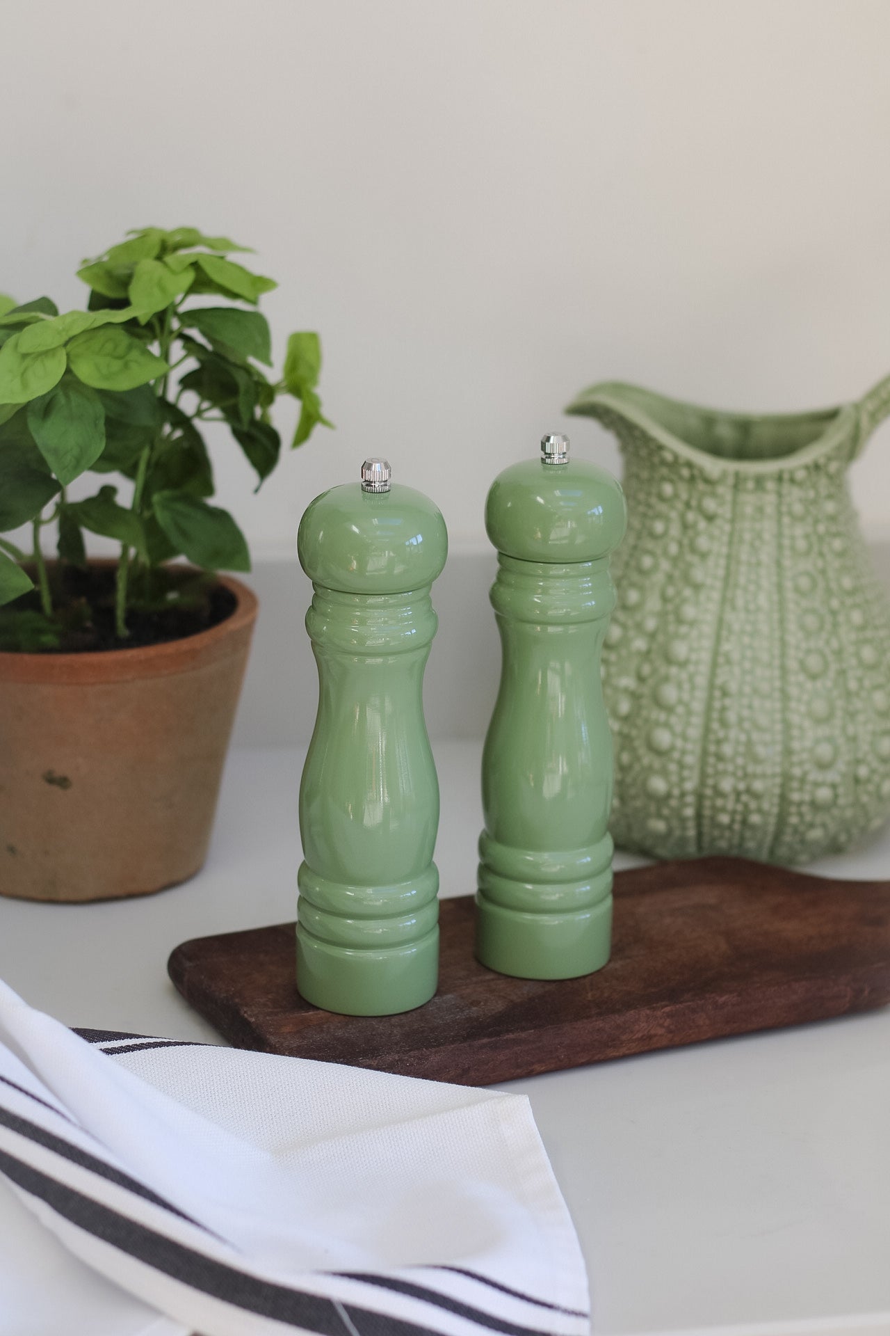 earth green salt and pepper grinders for timeless kitchen decor