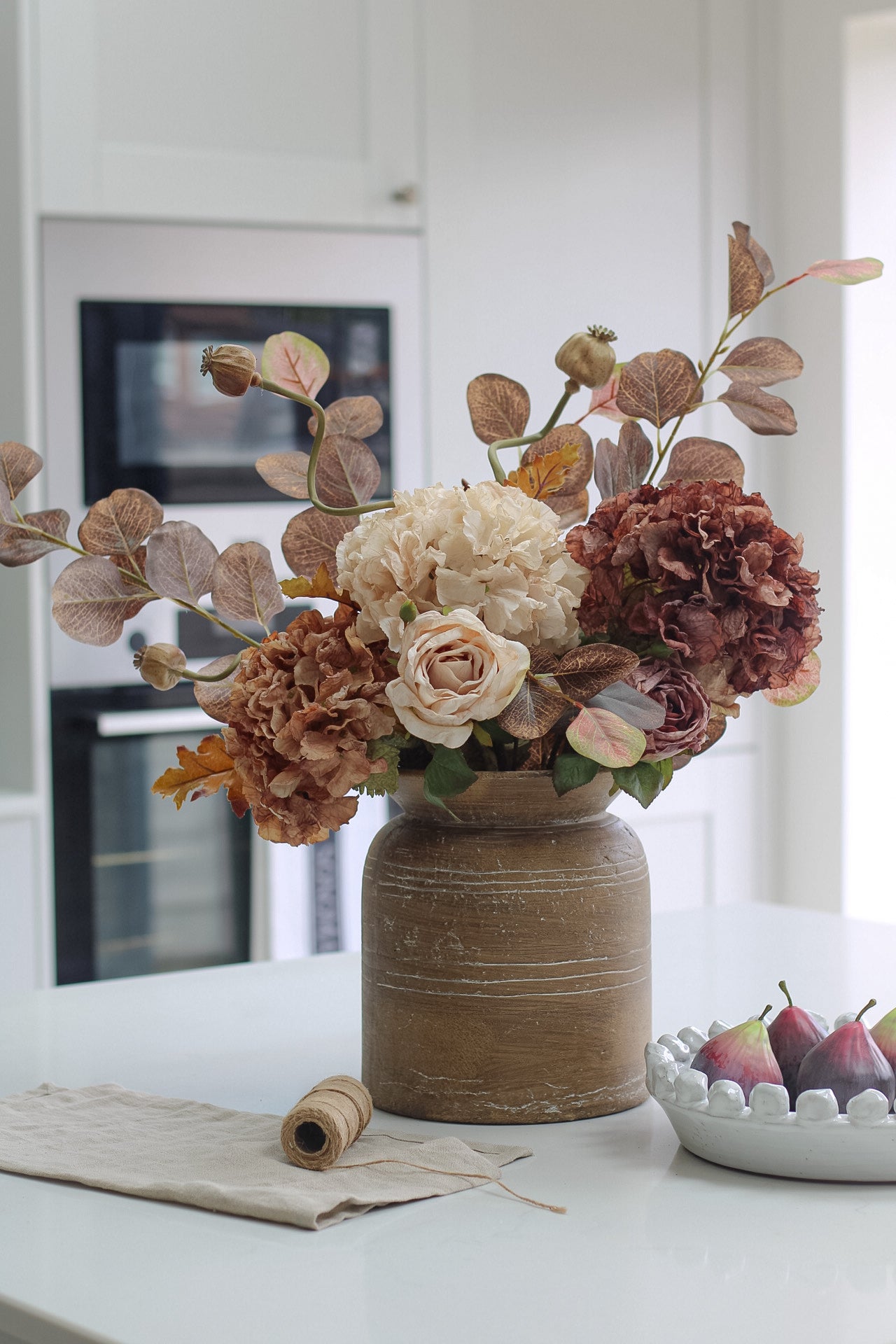 earthy faux floral arrangement