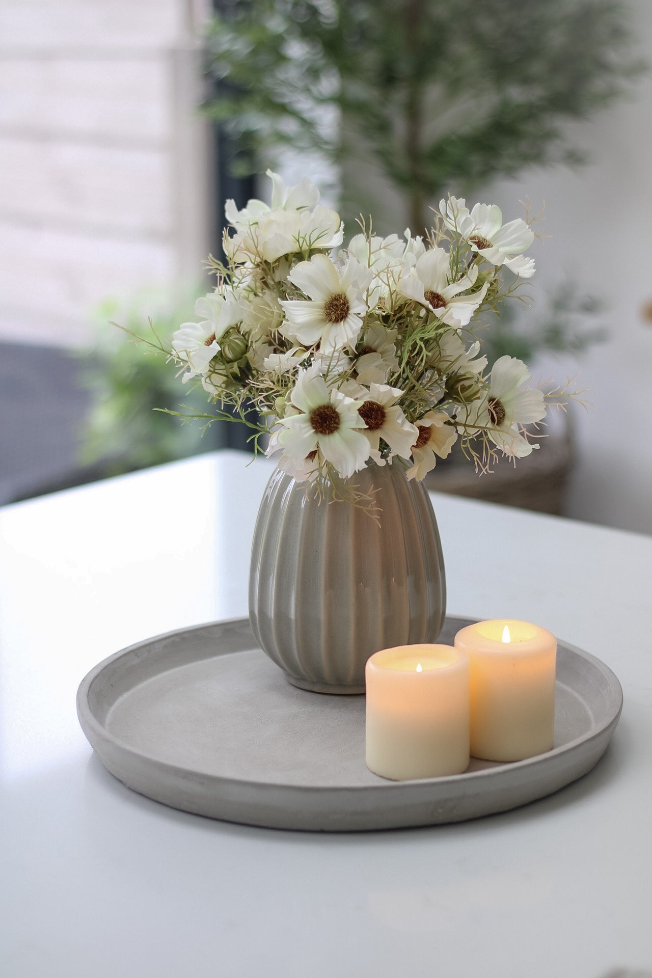 pretty faux cream cosmos flowers in grey ribbed vase