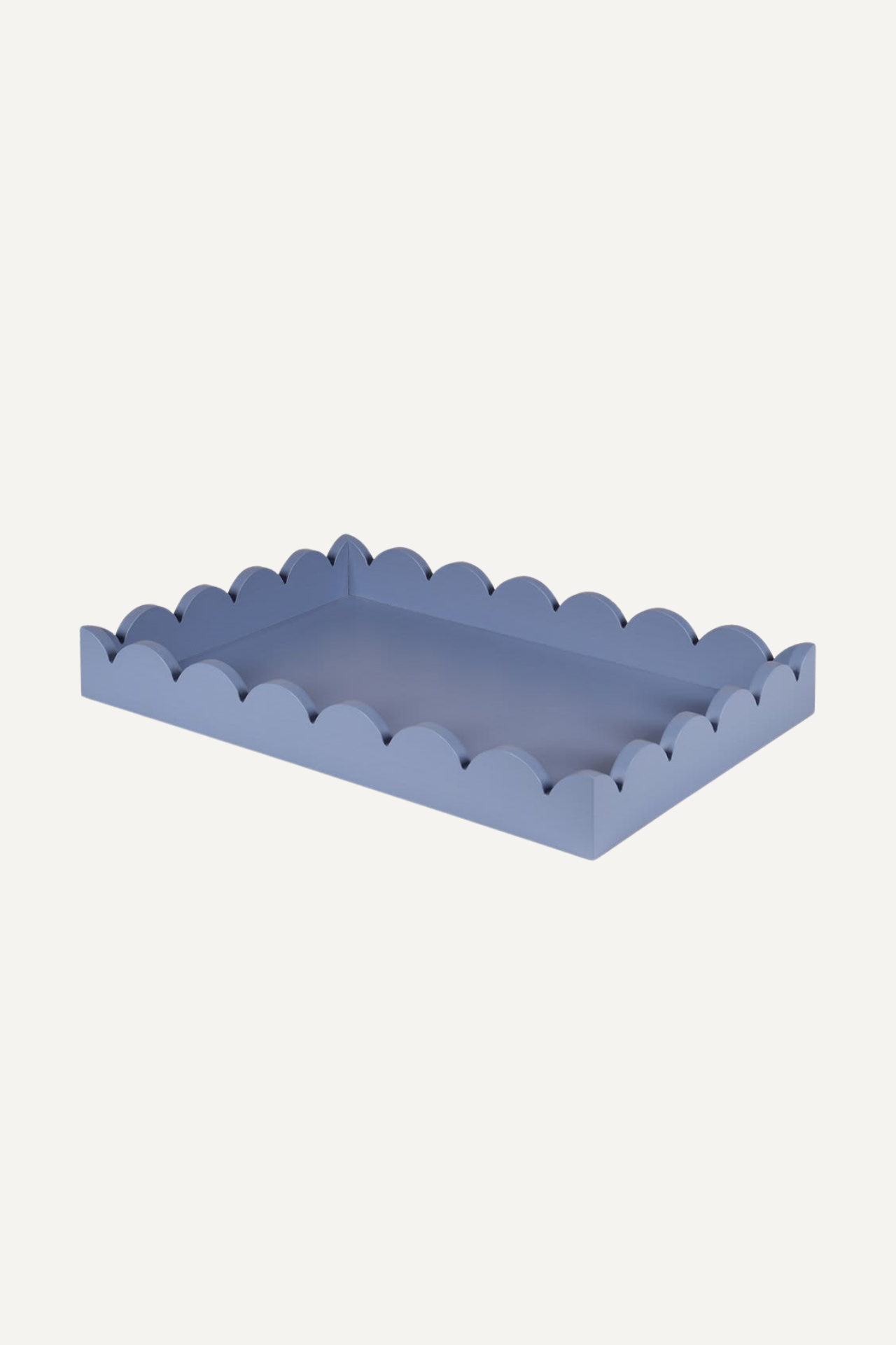 grey rectangular tray with scallop edges for coffee table styling