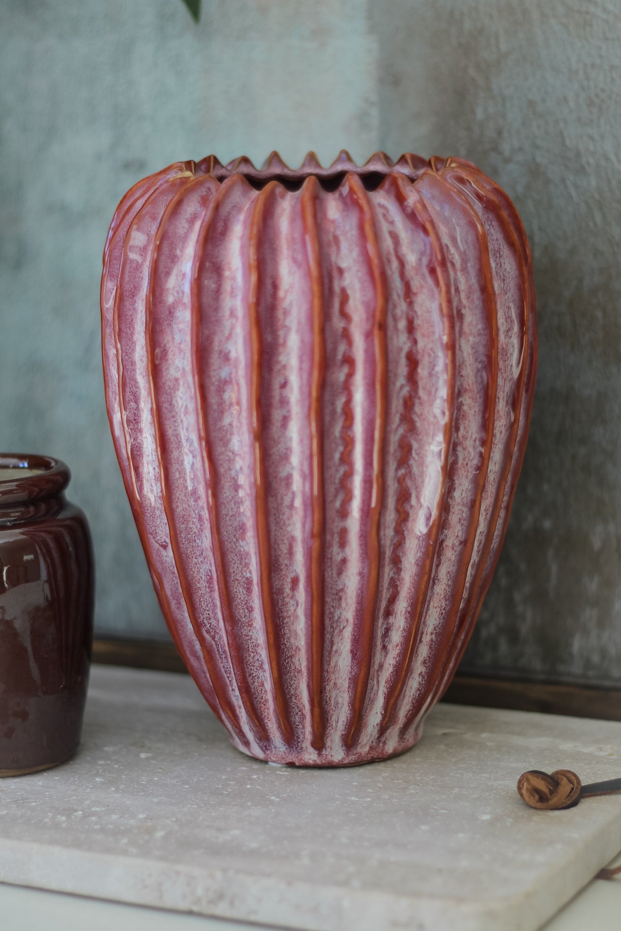 ceramic pink ribbed vase for faux flower arrangement