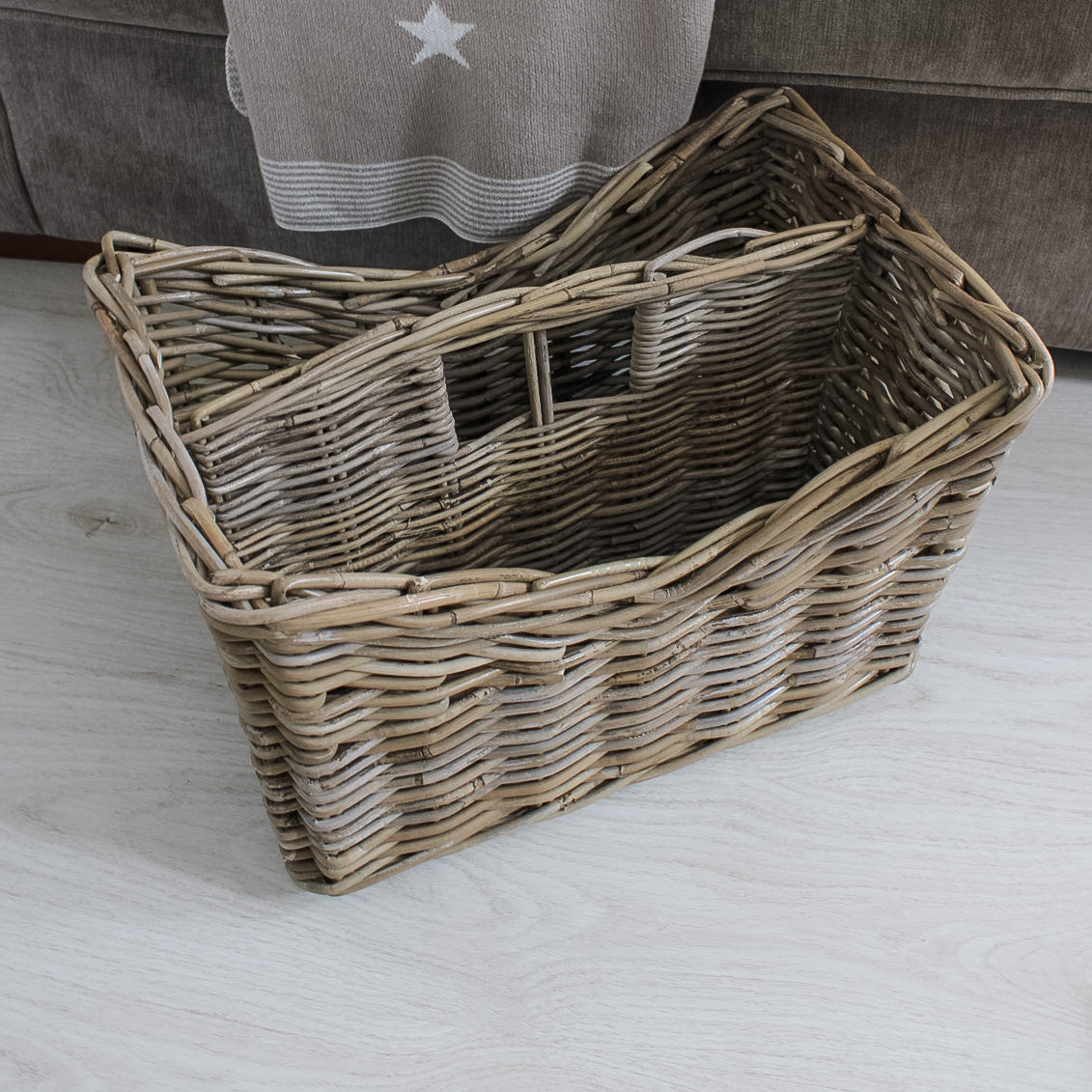 up close of rattan magazine storage basket