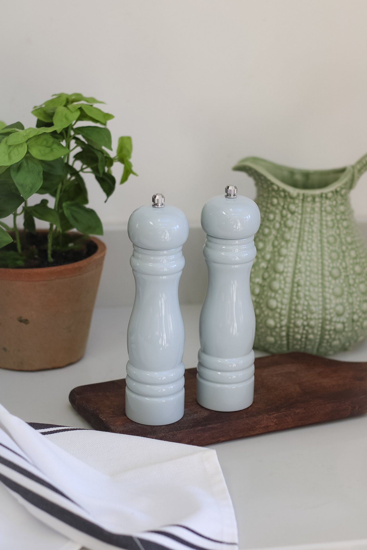 light blue salt and pepper grinders for timeless kitchen decor