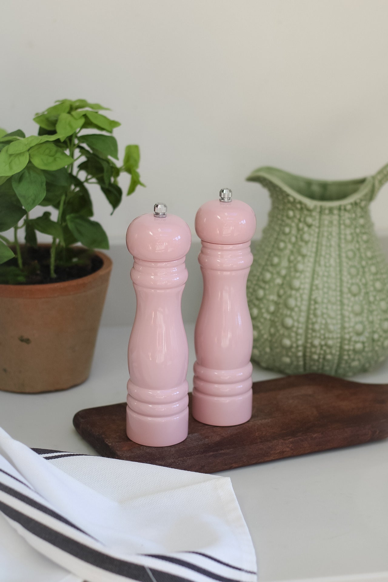 pink salt and pepper grinders for timeless kitchen decor