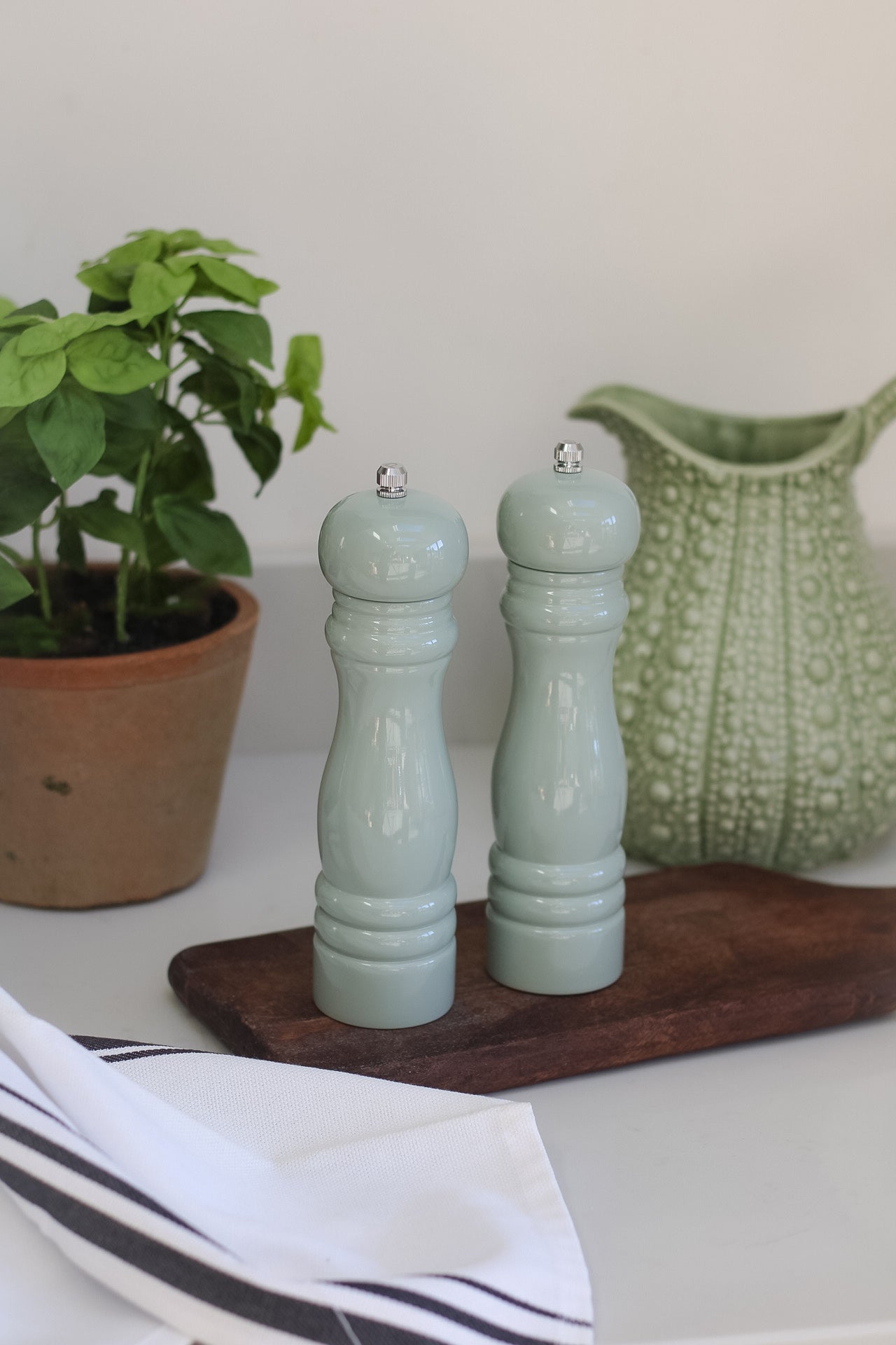 sage salt and pepper grinders for timeless kitchen decor