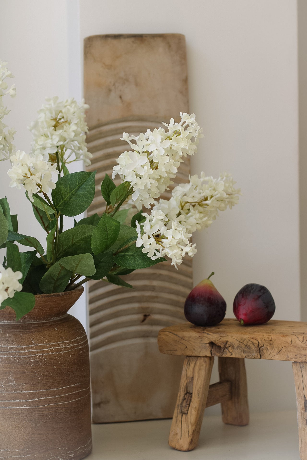 up close of faux cream lilac stem