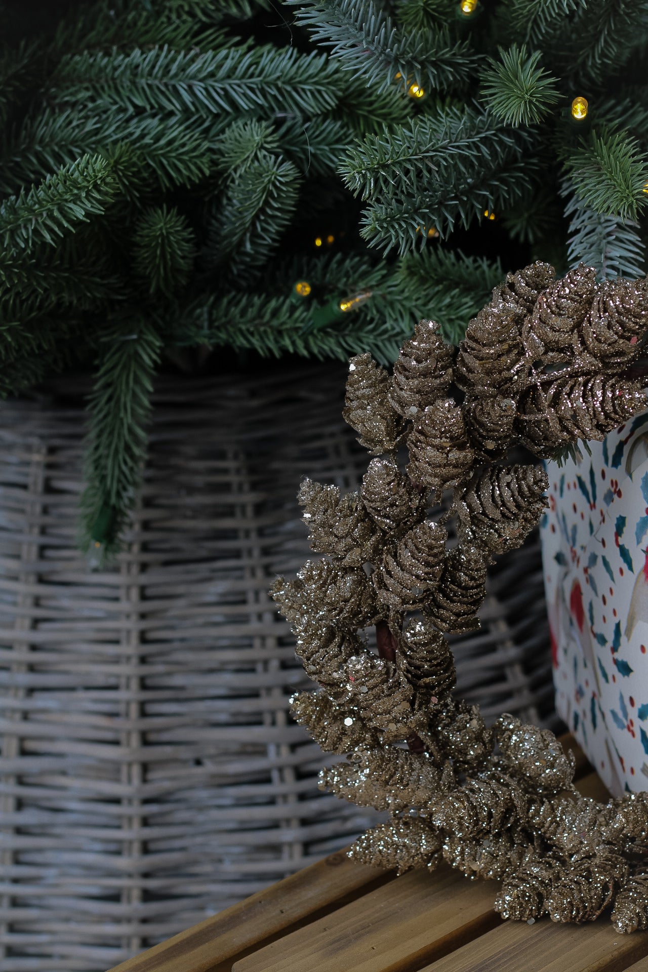 up close of gold pine cone wreath