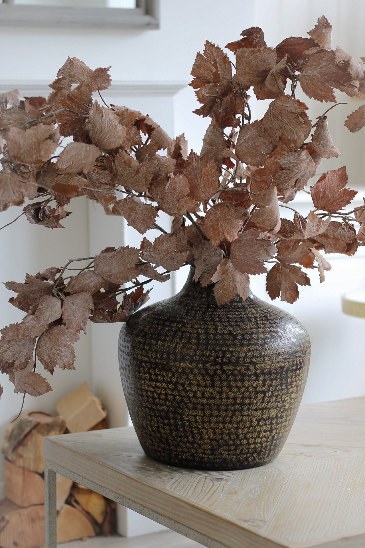 Introduce rich brown tones to your home decor with woburn hammered metal pot