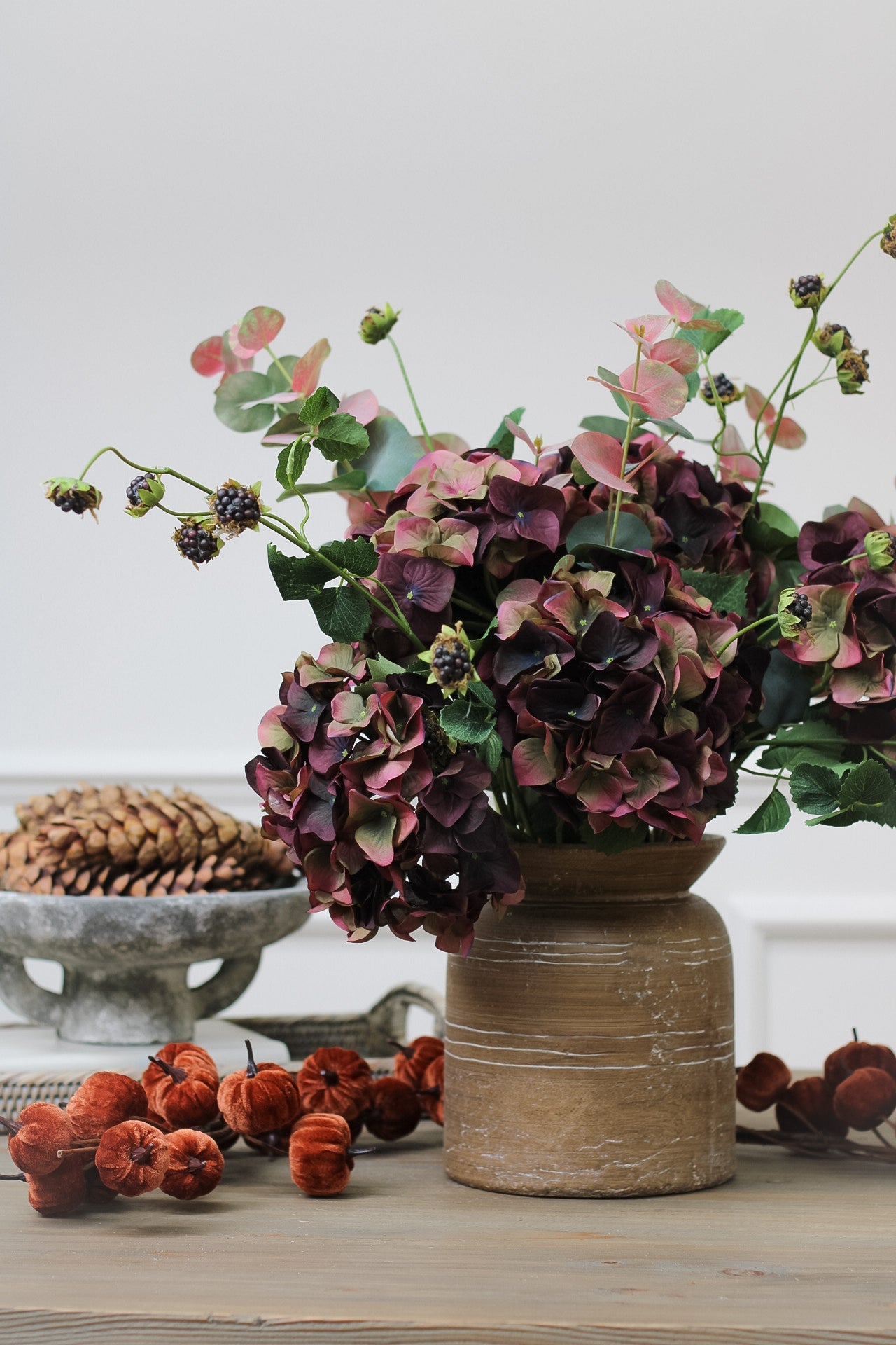 Faux fig and olive hydrangeas with blush eucalyptus and blackberries arrangement