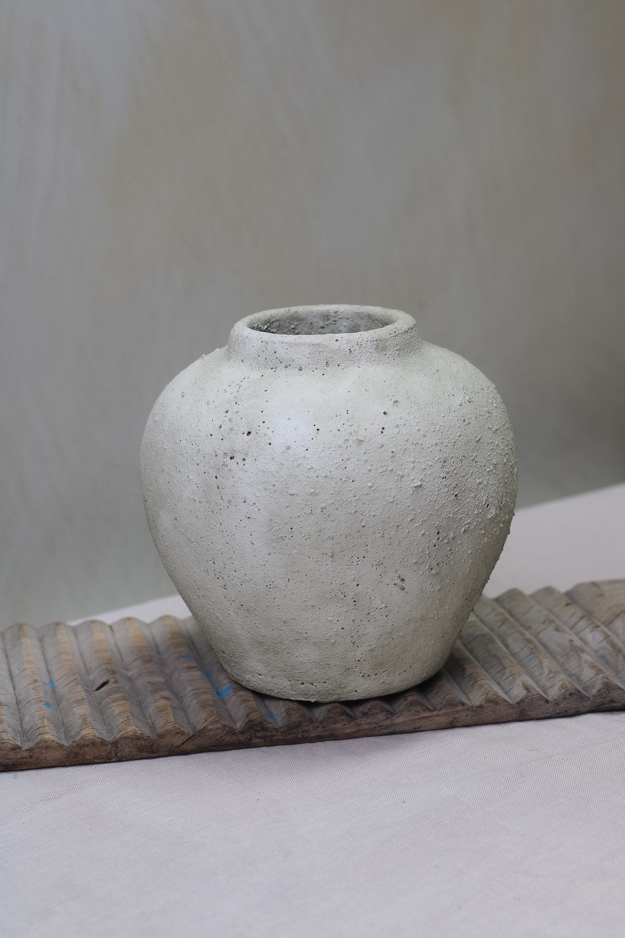 up close of rustic stone vase